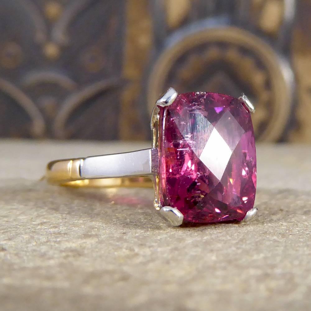 Created in the Art Deco era, this beautiful ring is featuring a Pink Tourmaline stone measuring 10mm by 8mm in size and showing light inclusions in the stone giving it character and dimension. The Pink Tourmaline is fixed securely in a four claw