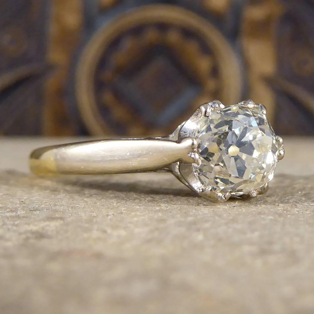This absolutely stunning Diamond ring is set with a 1.41ct Old Cut Diamond in a simple White Gold setting, leading down to a 18ct Yellow Gold band. The perfect classic engagement ring for any lucky person. Layaway/Partial Payment options