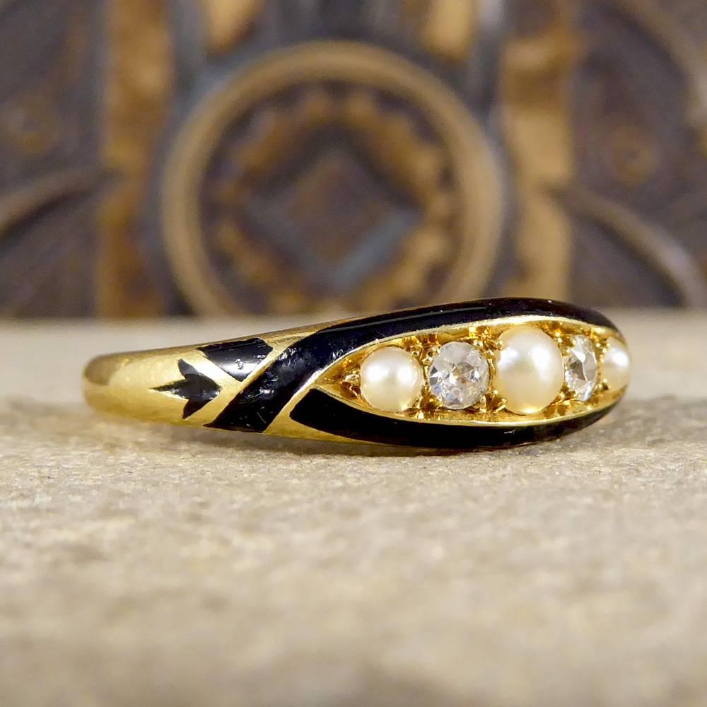 This Late Victorian mourning ring has been created in 18ct yellow Gold with Black Enamel detailing. The black enamel is used in mourning jewellery to symbolise the lack of light and lack of life, often worn in remembrance of a loved one in the