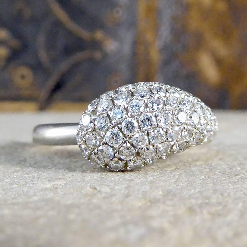 This fabulous diamond ring is set in a teardrop domed design that accentuates stones sparkle! Modeled in 18ct White Gold and containing the total diamond diamond content of 0.75ct, it really dazzles on the finger!

Ring Size: UK N 1/4 or US 6 3/4