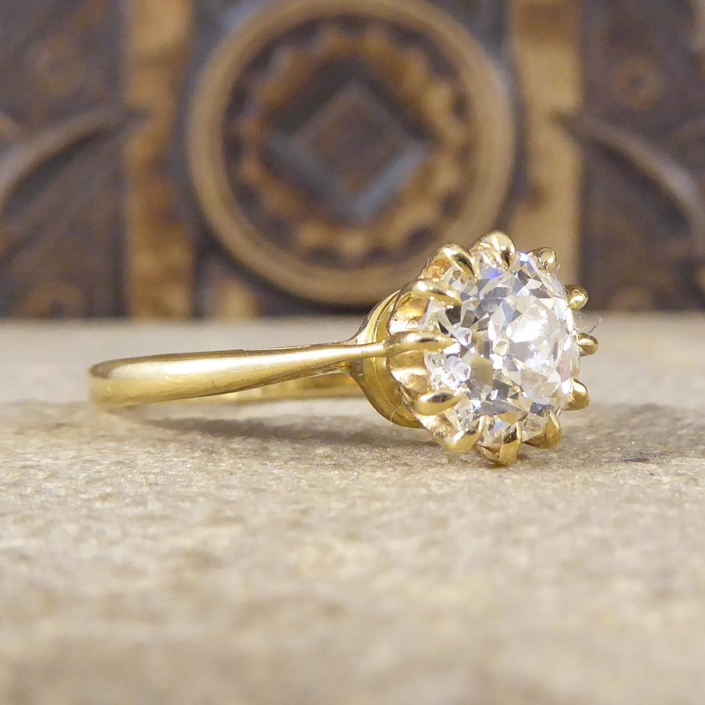This absolutely beautiful vintage solitaire hold a 1.50ct European Cut Diamond. Being held into place in a 12 claw setting makes this solitaire slightly different to a classic, giving it that lovely edge. All fully crafted from 18ct yellow Gold this