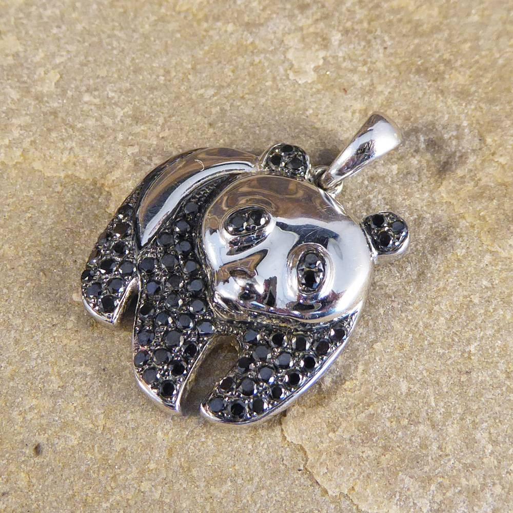 Such a cute little Panda pendant, created by Paillard and stamped 18k on the reverse. This pendant is set with small black Diamonds weighing approximately 0.35ct which reflects onto the piece itself as the black Diamonds are rare as is the Panda.