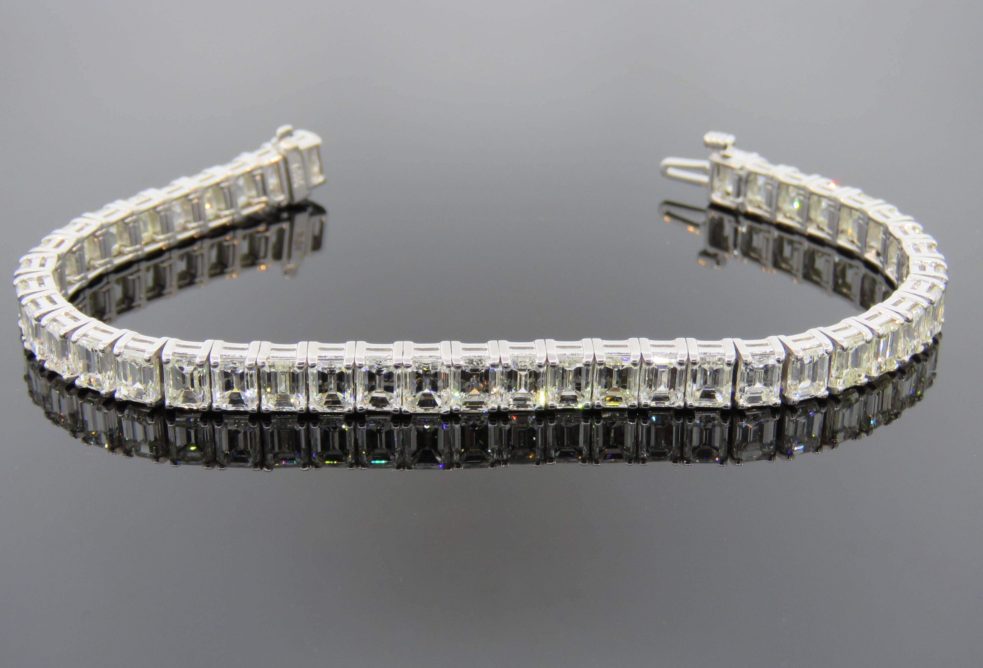 42 emerald cut diamonds, weighing a total of 22 carats make up this incredible bracelet! With an average of .52 pts per stone, these prong set diamonds come together to make an eye-catching, breathtaking bracelet. 
These high-quality, VS-SI clarity,