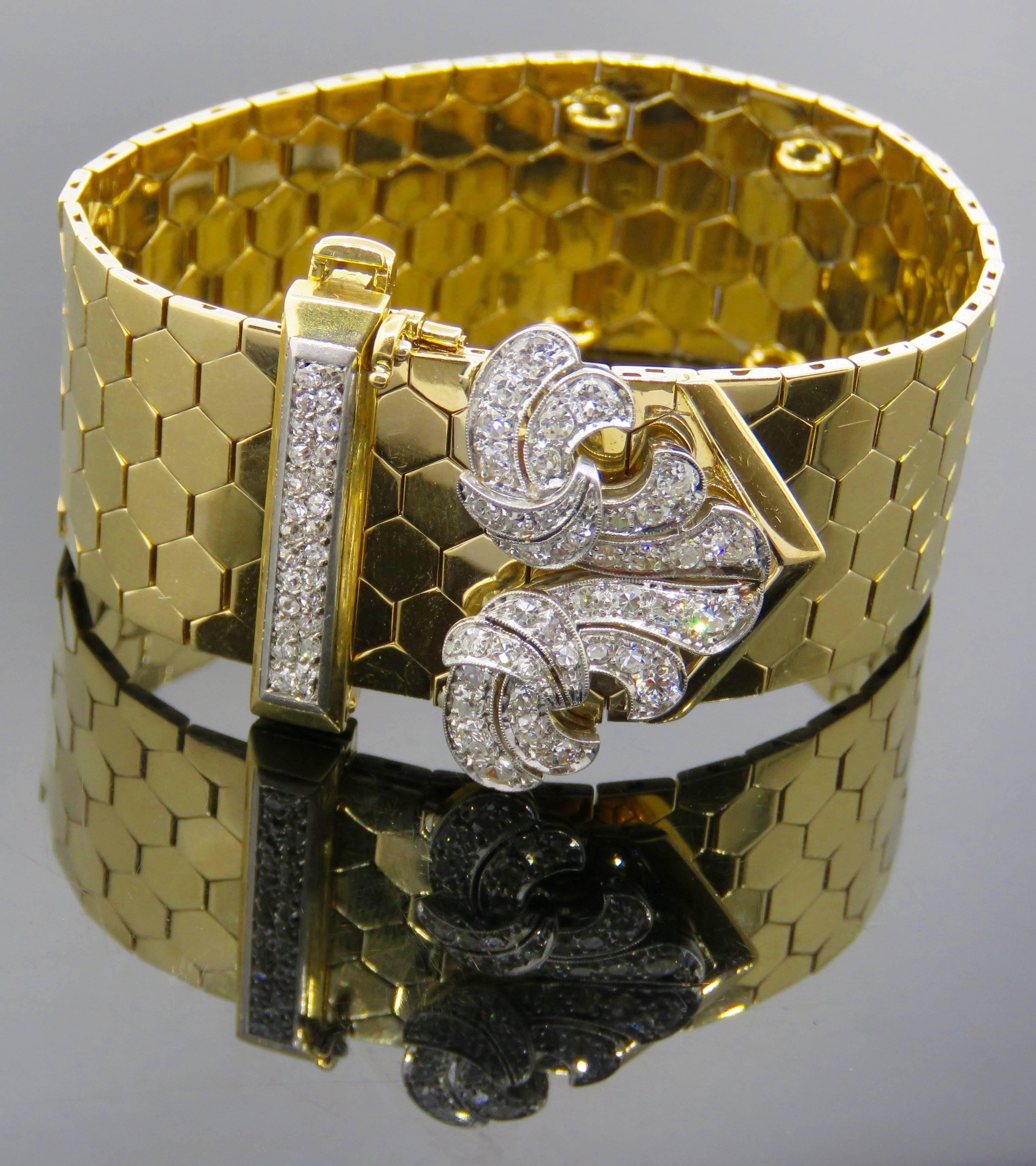 Elegant and classic retro gold Van Cleef & Arpels buckle bracelet studded with 68 diamonds. 