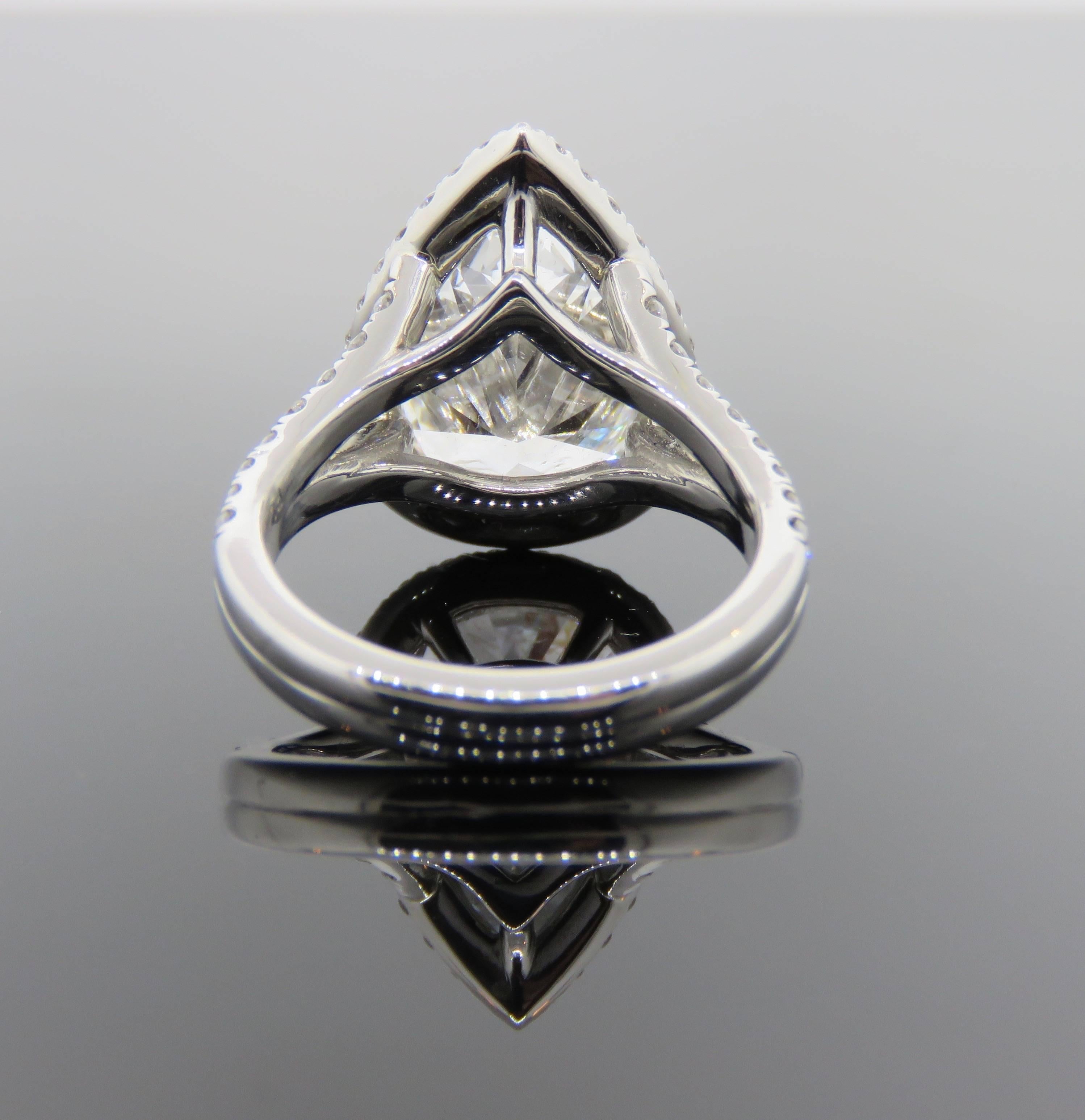 Modern Pear Shape Halo Diamond Ring