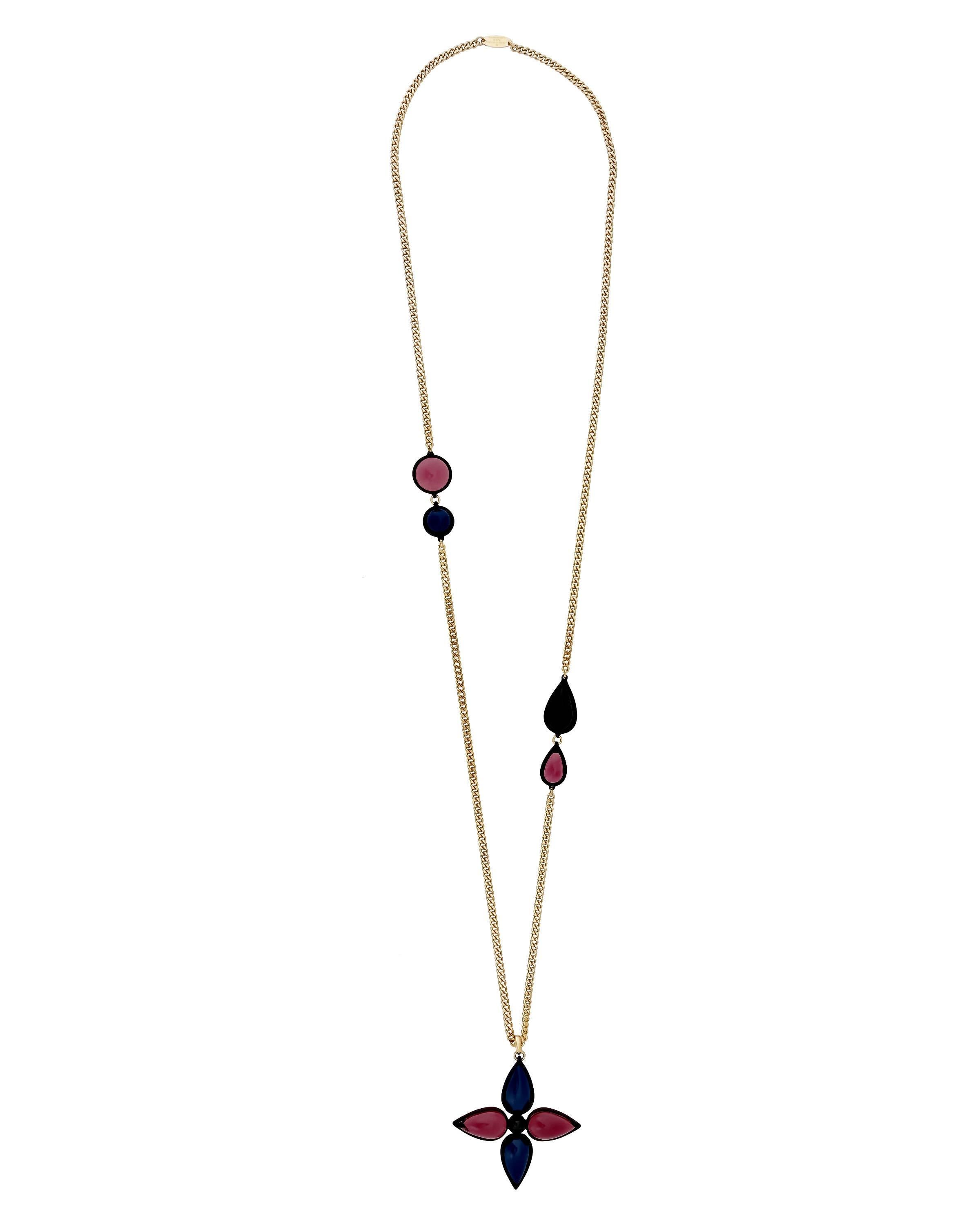 Louis Vuitton Gold Tone Tourmaline with Black & Blue Enamel Monogram Necklace. Length is 34 inches long.