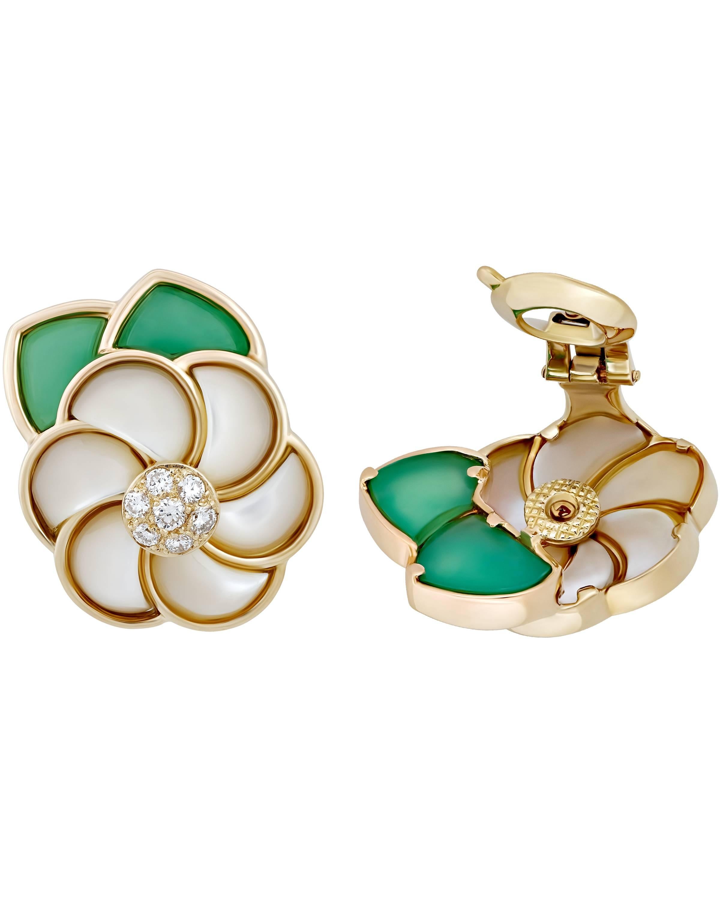 Only Van Cleef & Arpels can make two floral earrings look like such a profound artistic achievement. Each earring features 7 pave prong set diamonds and a clip backing.

METAL TYPE: 18K Yellow Gold
STONE WEIGHT: 0.75ct twd
TOTAL WEIGHT: 20.4g

This