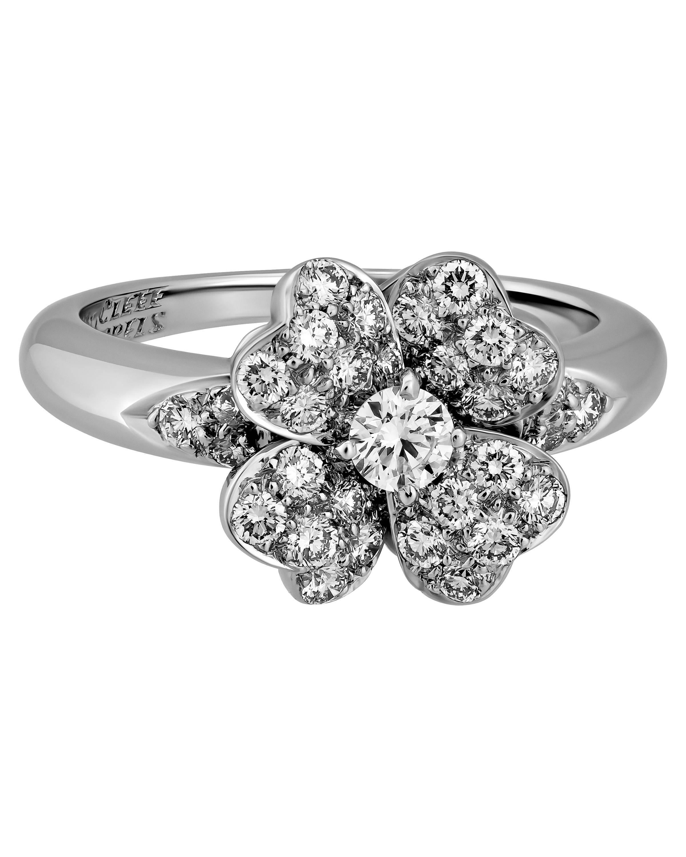 Van Cleef & Arpels 950 platinum diamond cosmos ring.
This stunning platinum diamond Cosmos ring is a size 6 and contains 1.60pts TCW. The total weight of this gorgeous VCA ring is 7.1 grams. The Hallmarked reads Van Cleef & Arpels, PT 950.