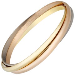 Cartier 18 Karat Yellow, White, and Rose Gold Trinity Bangle