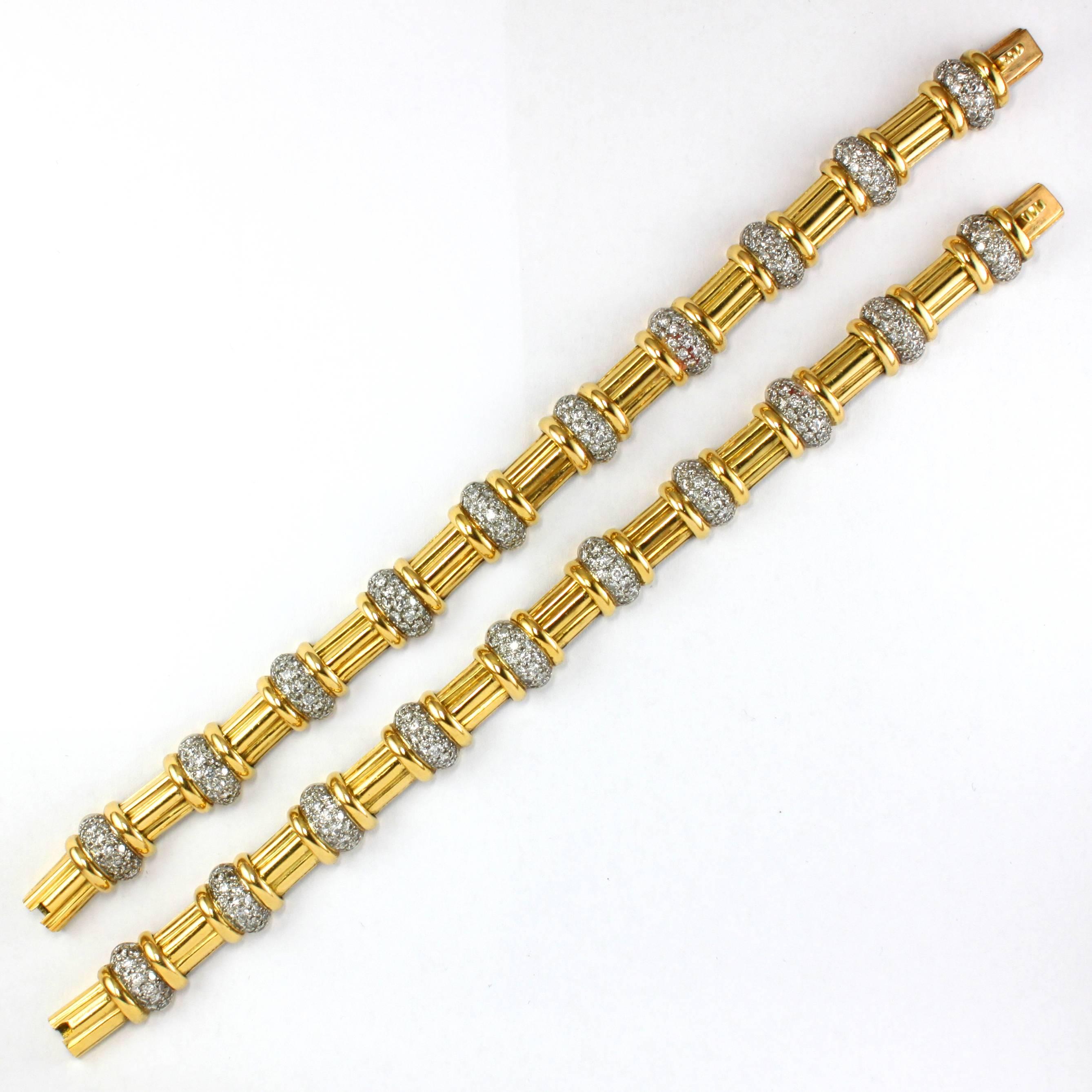 Very chic pair of 18k Gold and Diamond Bracelets in a Bamboo design, consisting of ca. 4 carats of diamonds (E-F colour, VS purity).

Both the bracelets could be combined to form a short choker as well.
