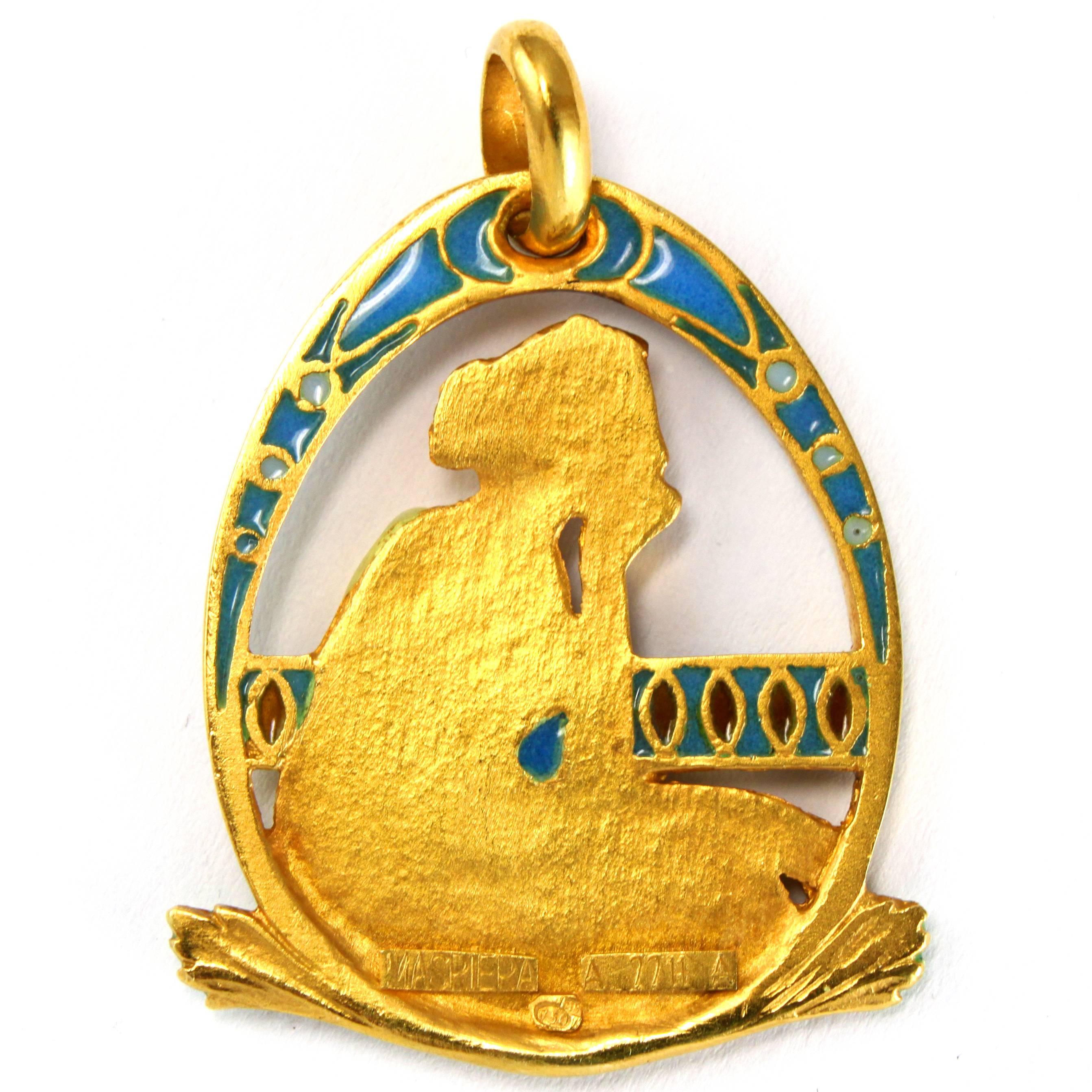 A Plique a Jour Enamel Pendant by Masriera

Depicting a thoughtful sitting maiden with beautiful window-enamelling, famous for the Art Nouveau Masriera pieces.