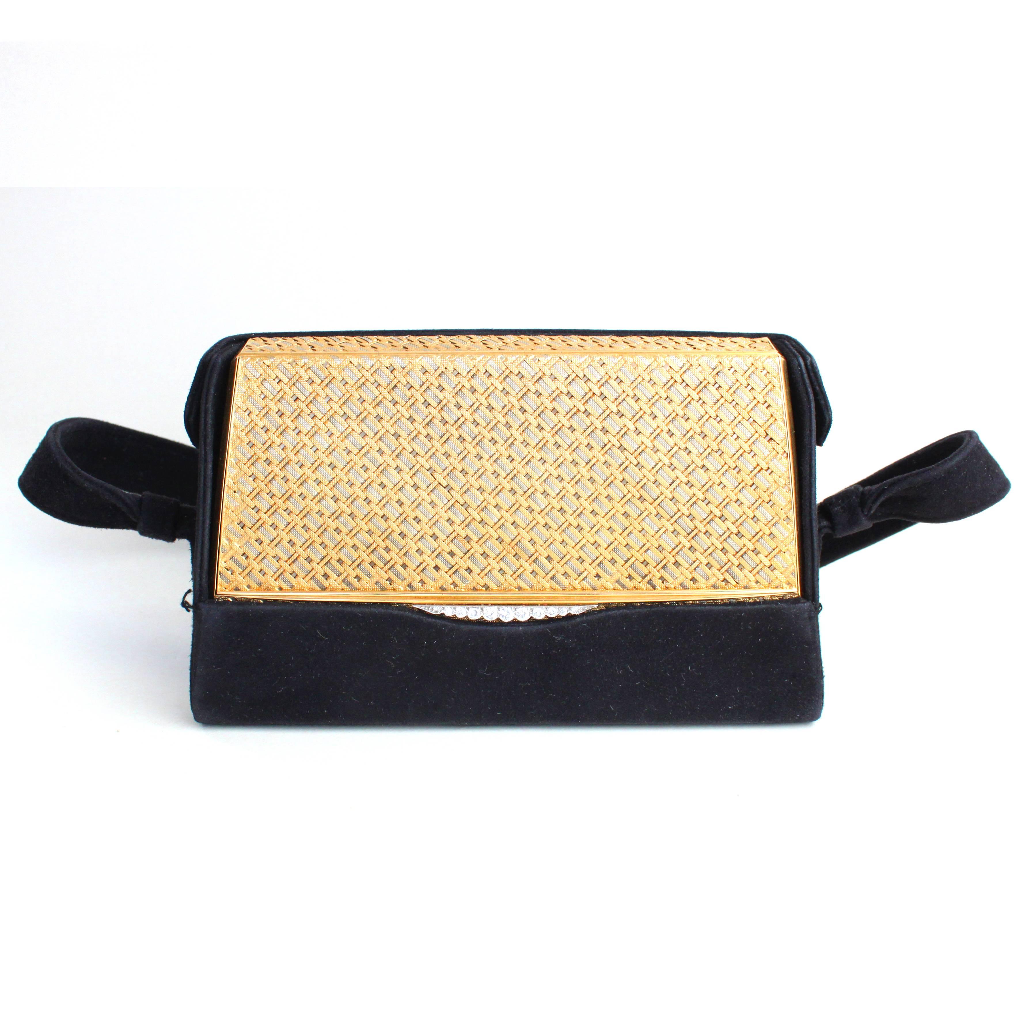 A rare Van Cleef & Arpels Gold and Diamond Evening Bag, ca. 1960s

The elegant evening bag is made of 18k yellow and white gold in a beautiful mesh design, closing with a diamond clasp.

It is accompanied by a velvet carrying case, making it a