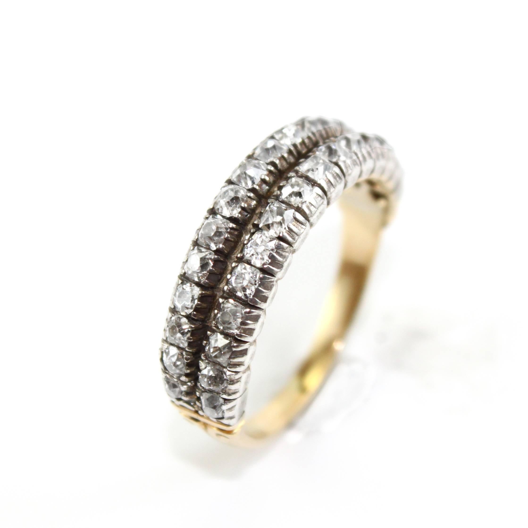 Victorian diamond ring with two rows of old European cut diamonds in yellow gold, ca. 1890s. The ring has 30 diamonds and the total diamond weight is circa 2.5 carats, H/I colour and VS clarity. With scratched inventory number.

Ring size 8.