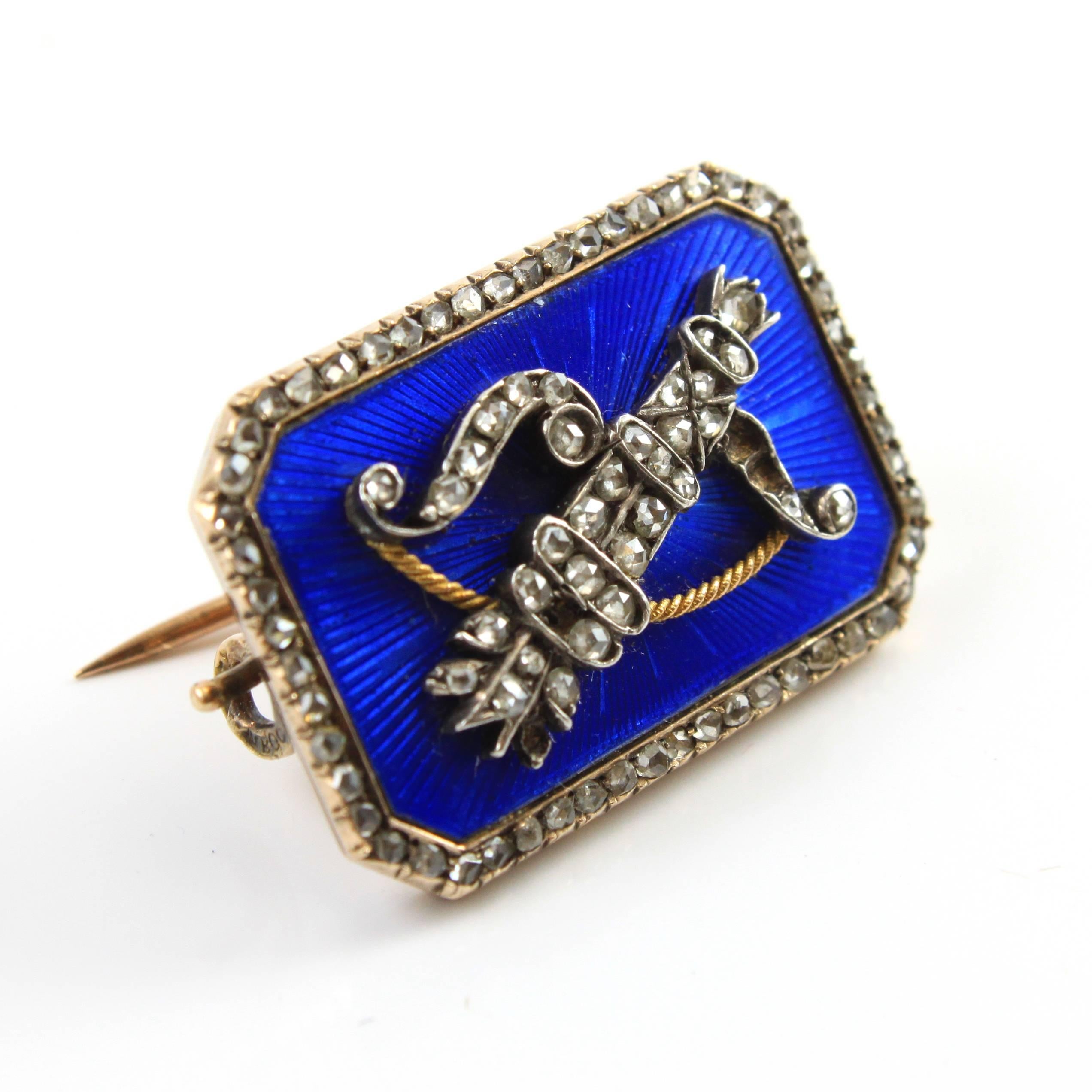 A beautiful and rare Enamel and Diamond Broach, by Fabergé work master Erik August Kollin, ca. 1890s

The broach features a stylised bow and arrow, studded with diamonds and based on a fine and very reflective blue guilloche enamel work.

About