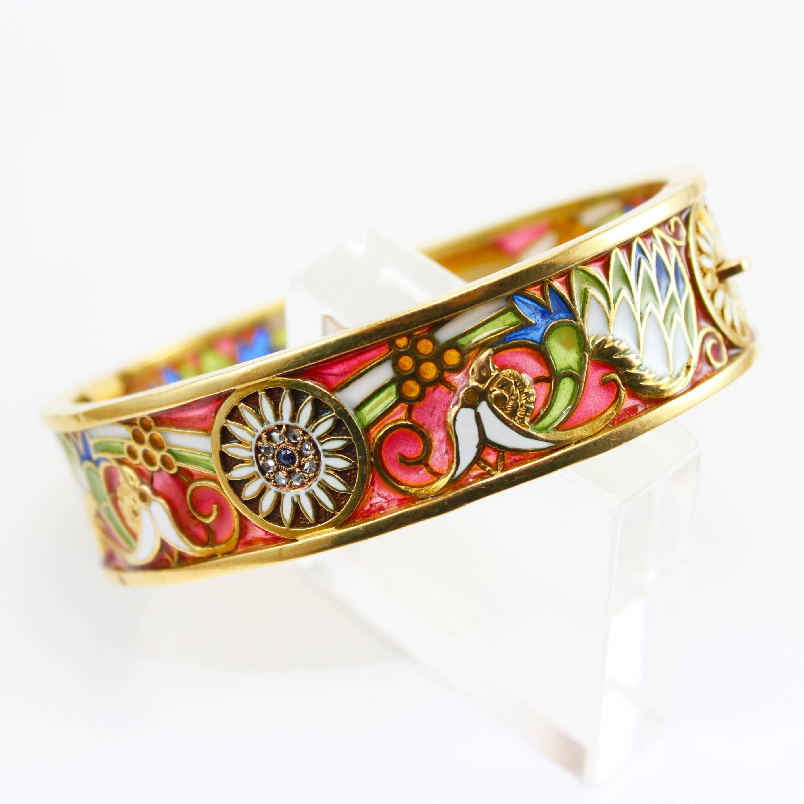 An Art Nouveau Plique a Jour Enamel Bangle, by Masriera y Carreras, ca. 1915

A beautiful and rare Art Nouveau bangle by the renowned spanish maker Masriera y Carreras, whose signature plique a jour enamelling (also known as window enamelling) is