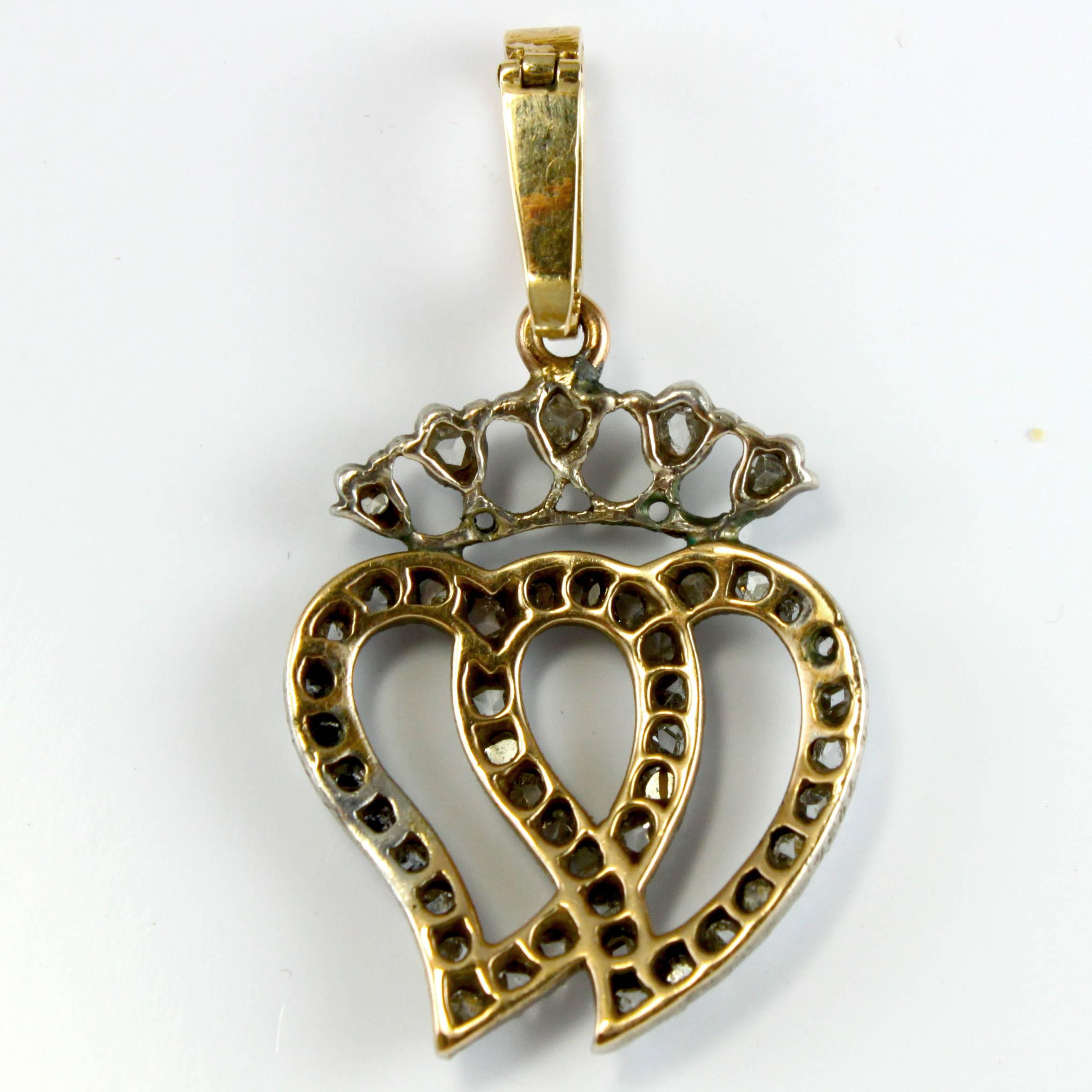 A lovely Victorian Diamond Sweetheart Pendant, ca. 1880s with two hearts and a crown, beautifully symbolising the ultimate love of two people. 
