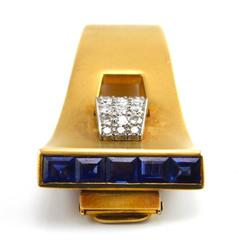 Spilla a clip retrò in oro 18 carati degli anni '40 con zaffiro e diamante