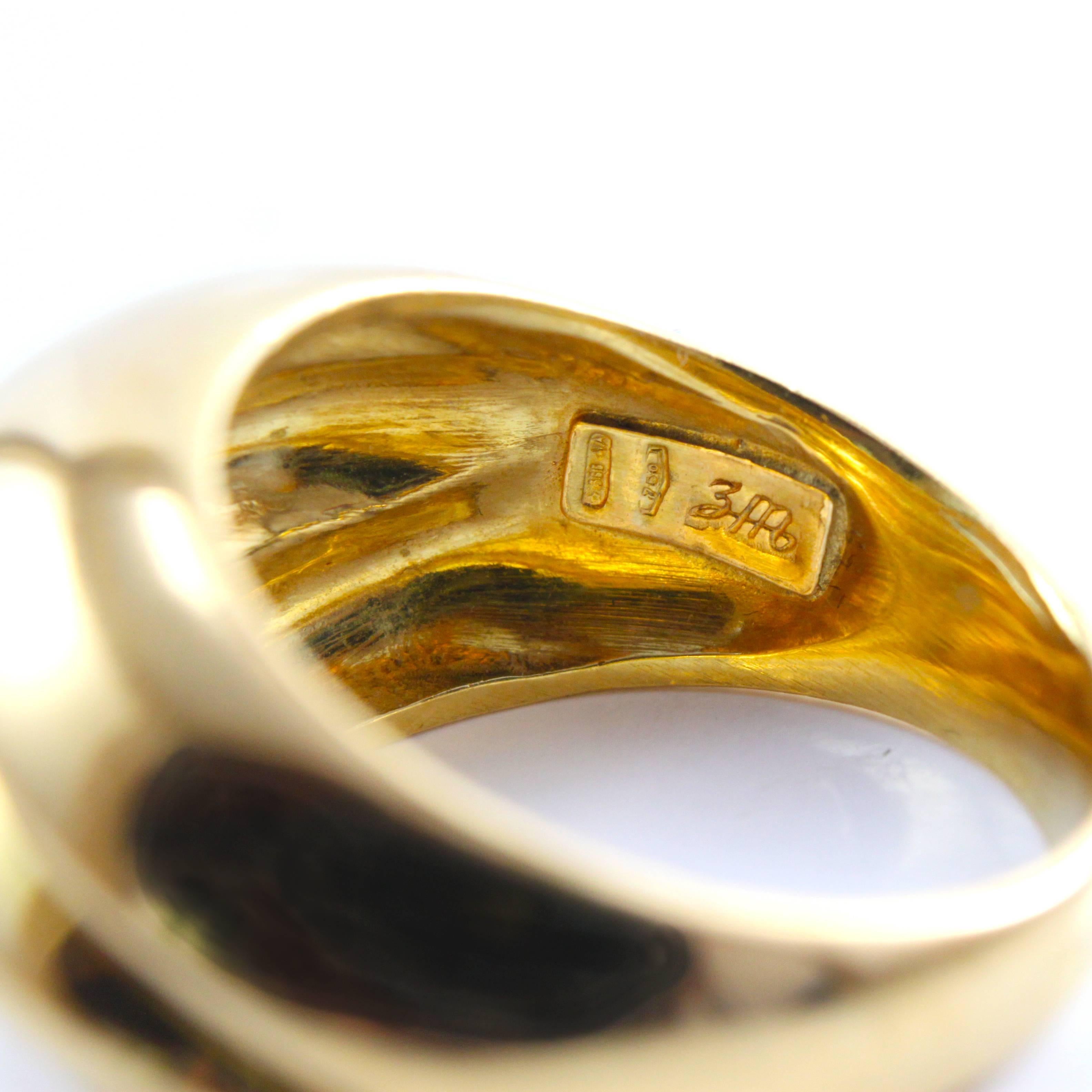 An 18k Gold Ring, ca. 1970s.

The ring has a wave design and is made of 18k gold. It has a very chic and sleek look.
 
Ring size 6 (can be altered).