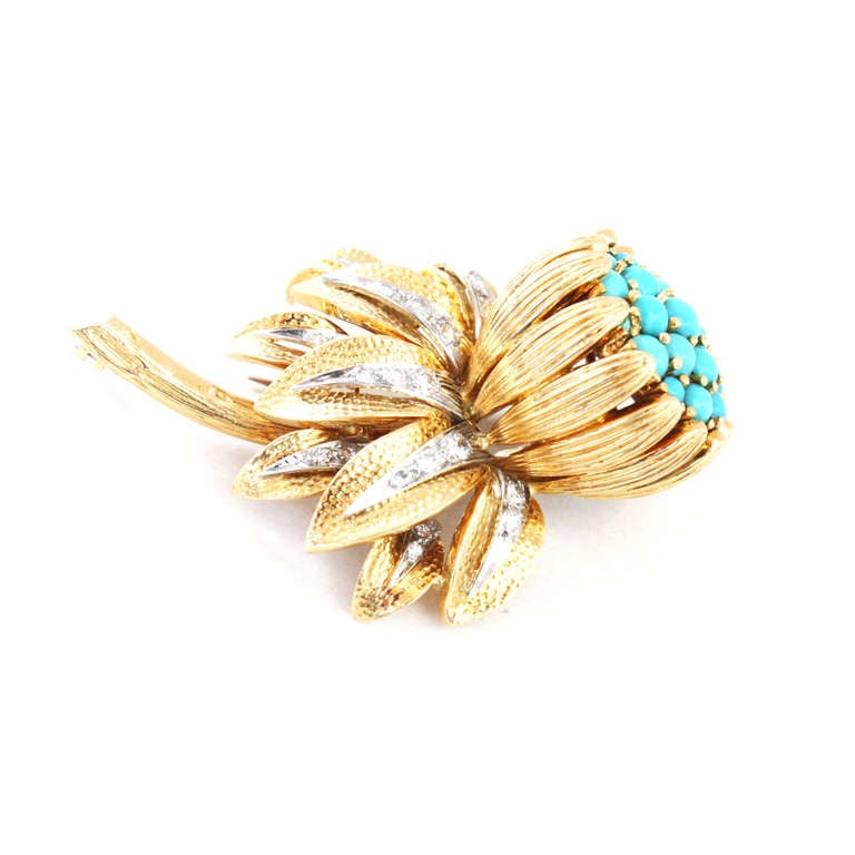 Pretty turquoise and diamond broach by Kutchinsky, London. The bud is set beautifully with turquoises and the leaves with diamonds and is mounted in yellow and white gold. Signed.