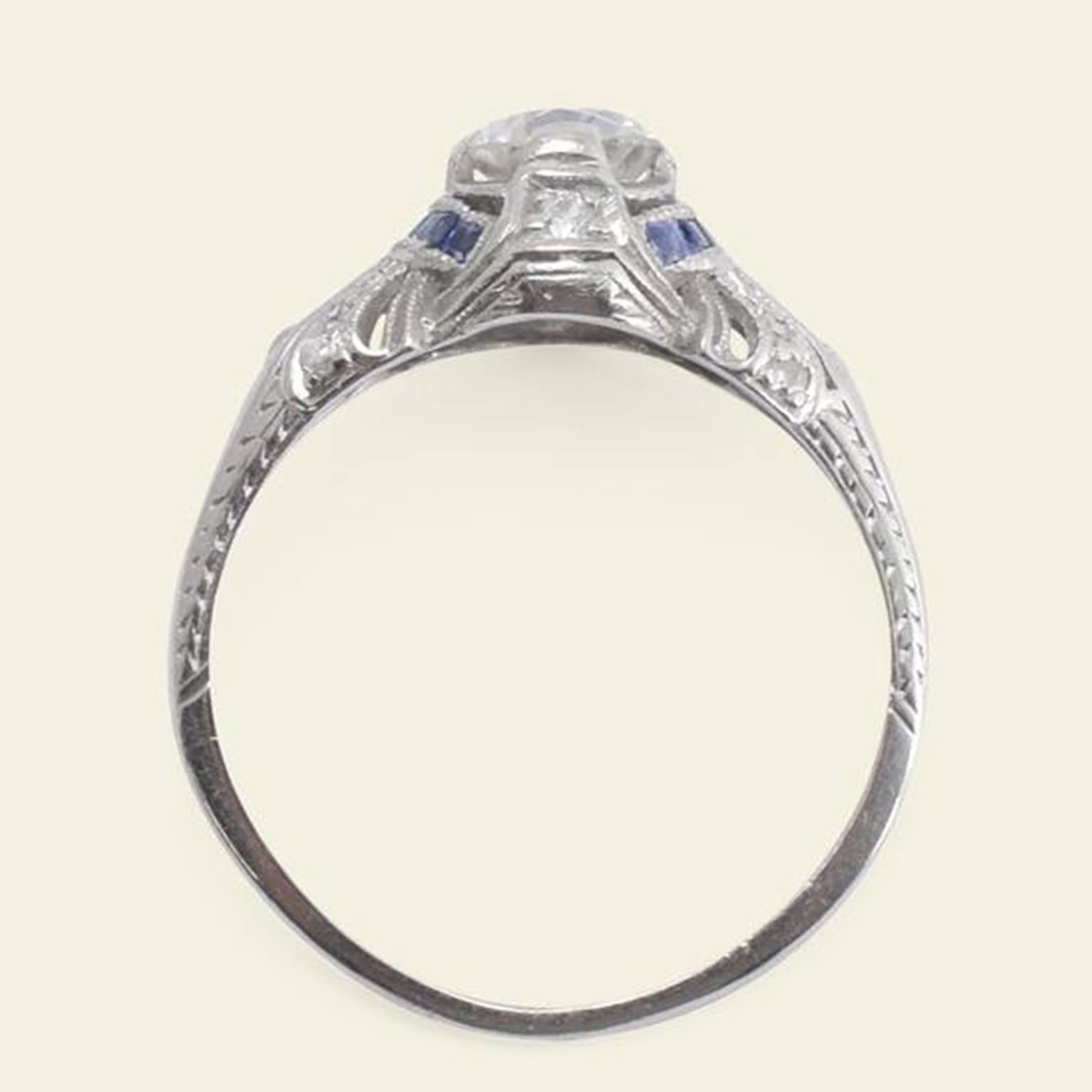 Art Deco Platinum .71 Carat Diamond Engagement Ring with Calibré Cut Sapphires In Good Condition For Sale In Brooklyn, NY