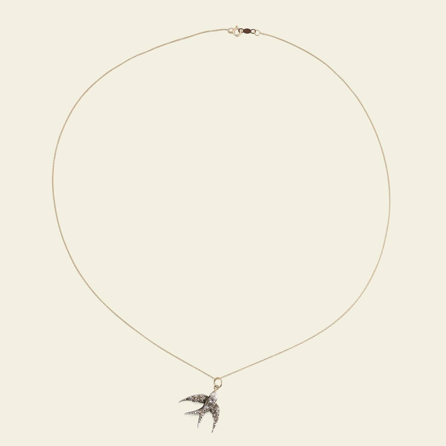 The migration of the swallow is one of the early signs of spring in the northern hemisphere. The lore surrounding the return of this seasonal bird centers around love, luck, and abundance. This Victorian swallow pendant is fashioned in 15k rose gold