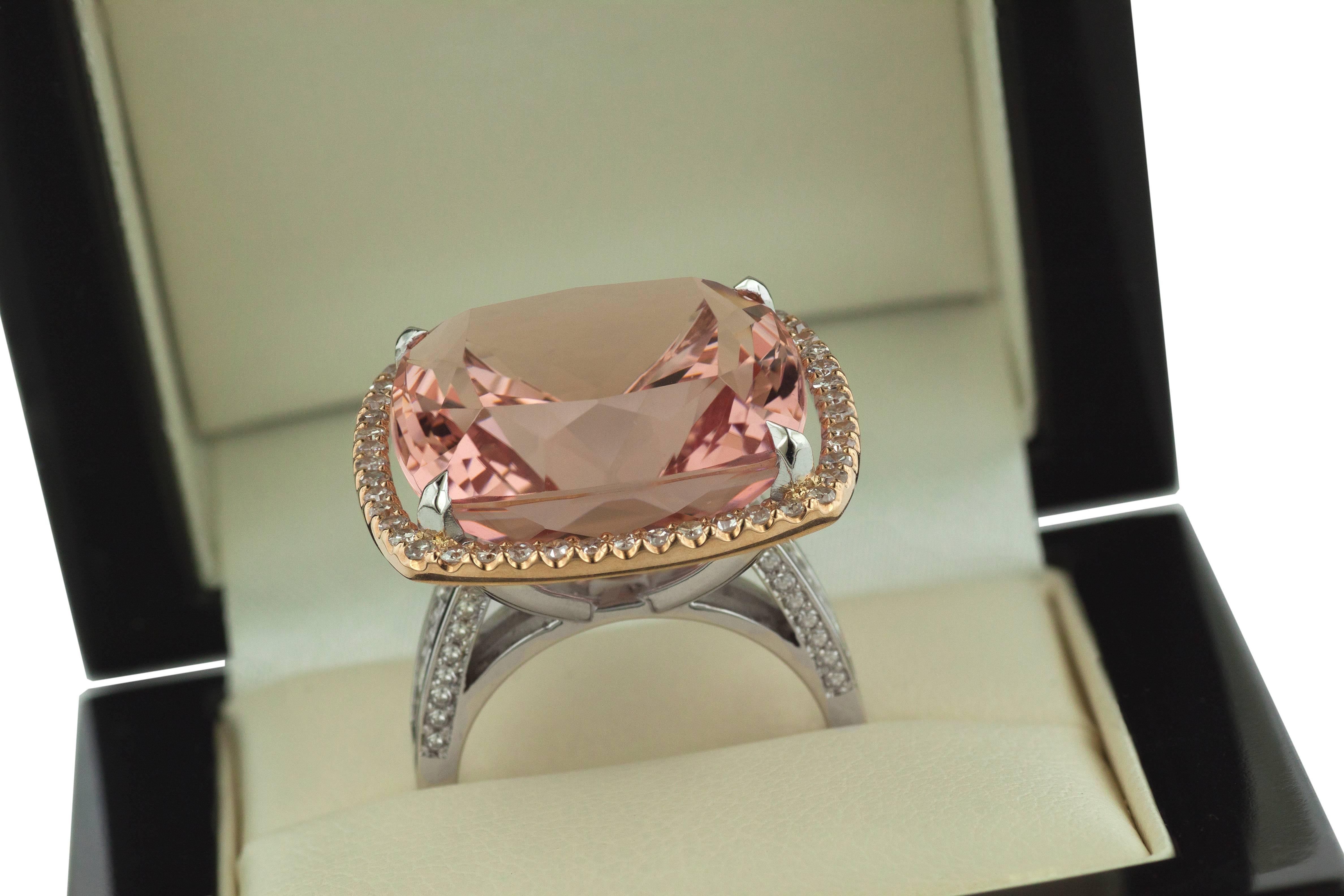 Brand new, one-of-a-kind, pink Morganite & Diamond cocktail ring. The white & rose gold ring is especially designed for this beautiful gemstone, to maximize its fire and sparkle. This exclusive jewelry piece contains 8 princess-cut diamonds