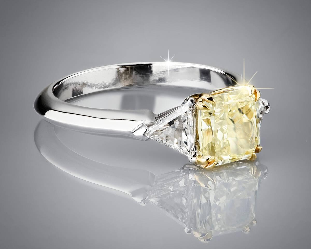 Contemporary 1.87 Carat Fancy Yellow Natural Diamond Three Stone Ring For Sale