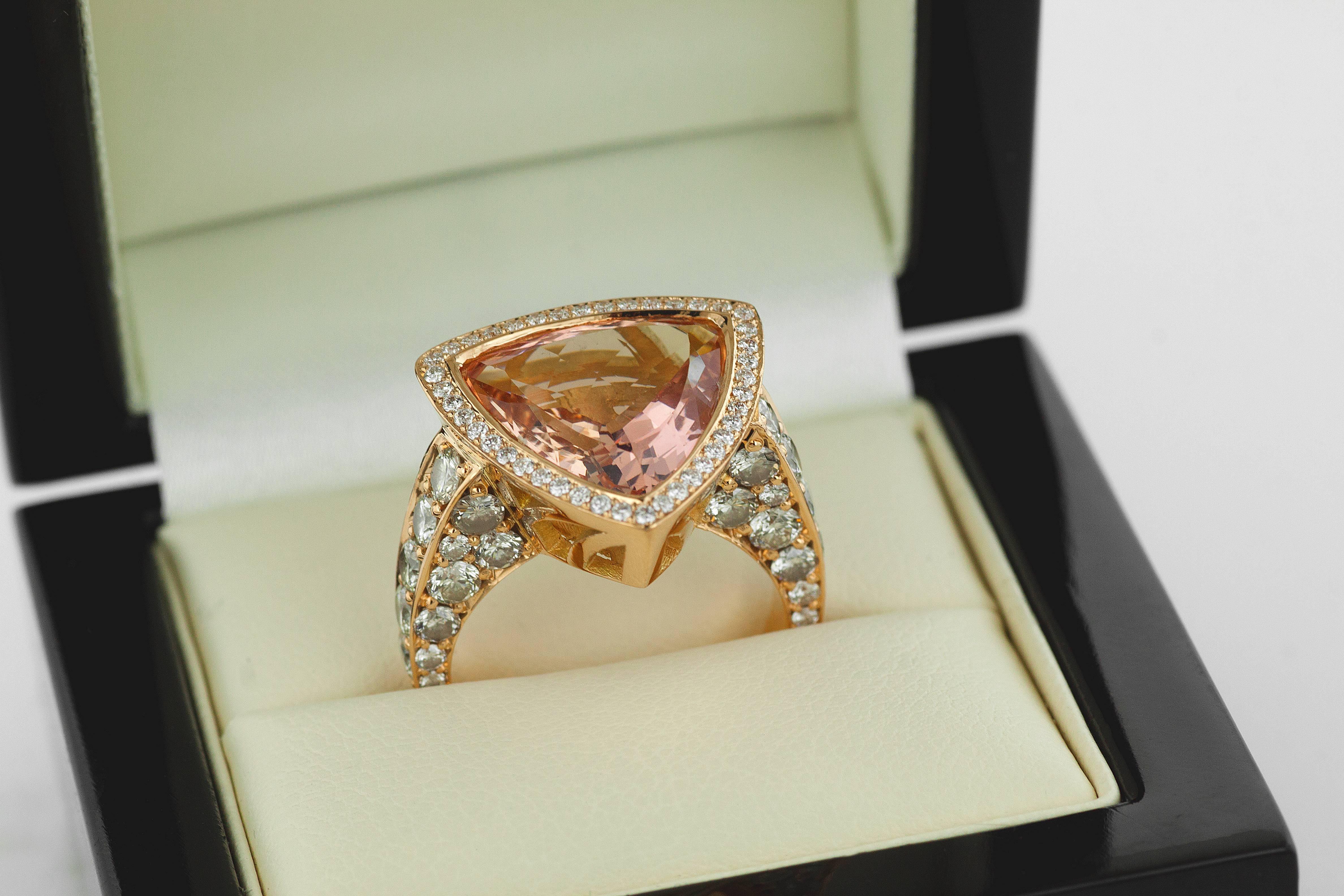 Brand new, one-of-a-kind, pink Morganite & Diamond cocktail ring. The rose gold mounting and setting are especially designed to fully protect the trilliant-cut gemstone, without losing its reflected light sparkle. The 6.40 carat morganite is