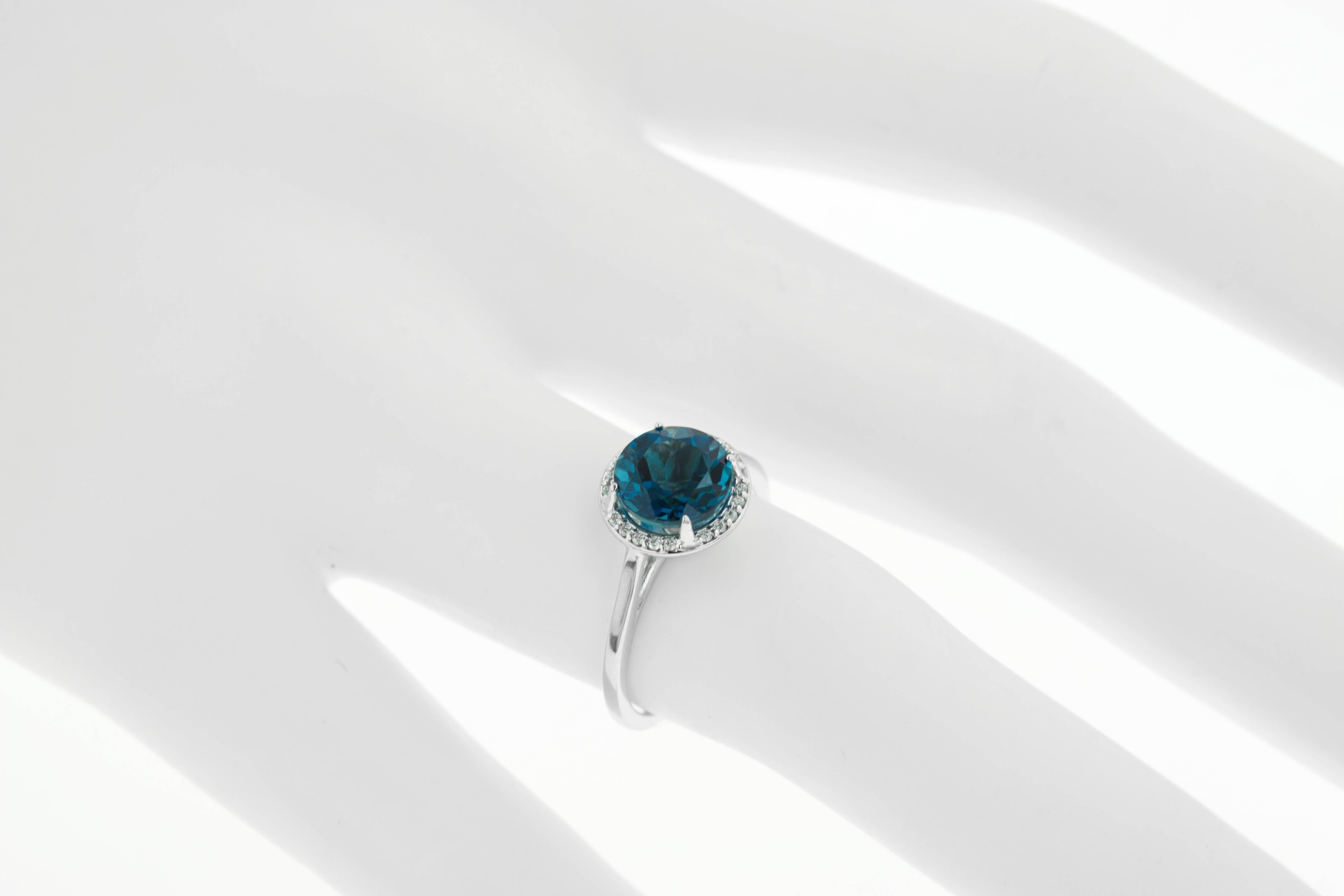 Contemporary London Blue Topaz and Diamond Cocktail Ring 14 Karat White Gold For Sale
