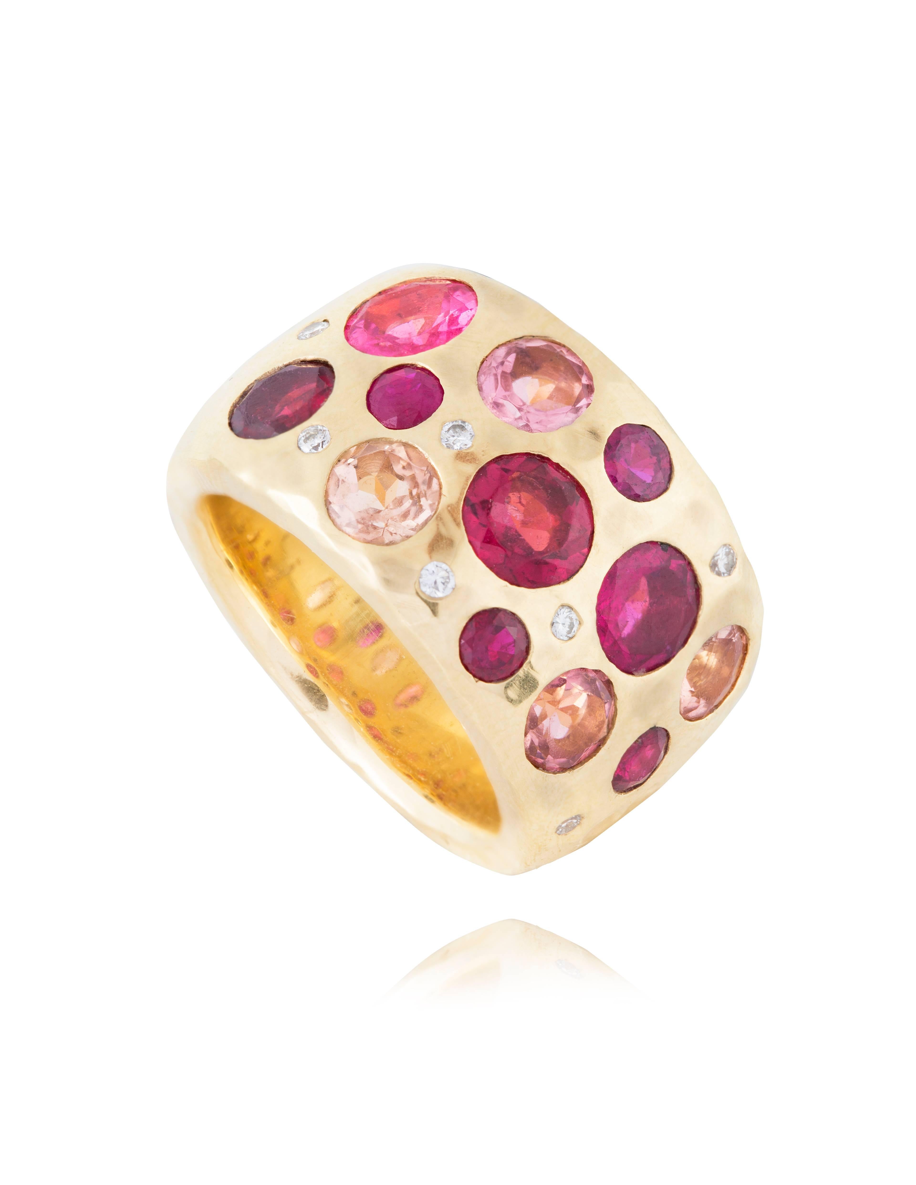 Pink Tourmaline, Ruby, Spinel and Diamond 18 Karat Gold Love Ring. 

The ring is handmade with a hand beaten gold finish. The ring is solid gold and has a feeling of weight to it. 

Ring size in stock is a US 8 / EUR 58

Additional sizes can be made