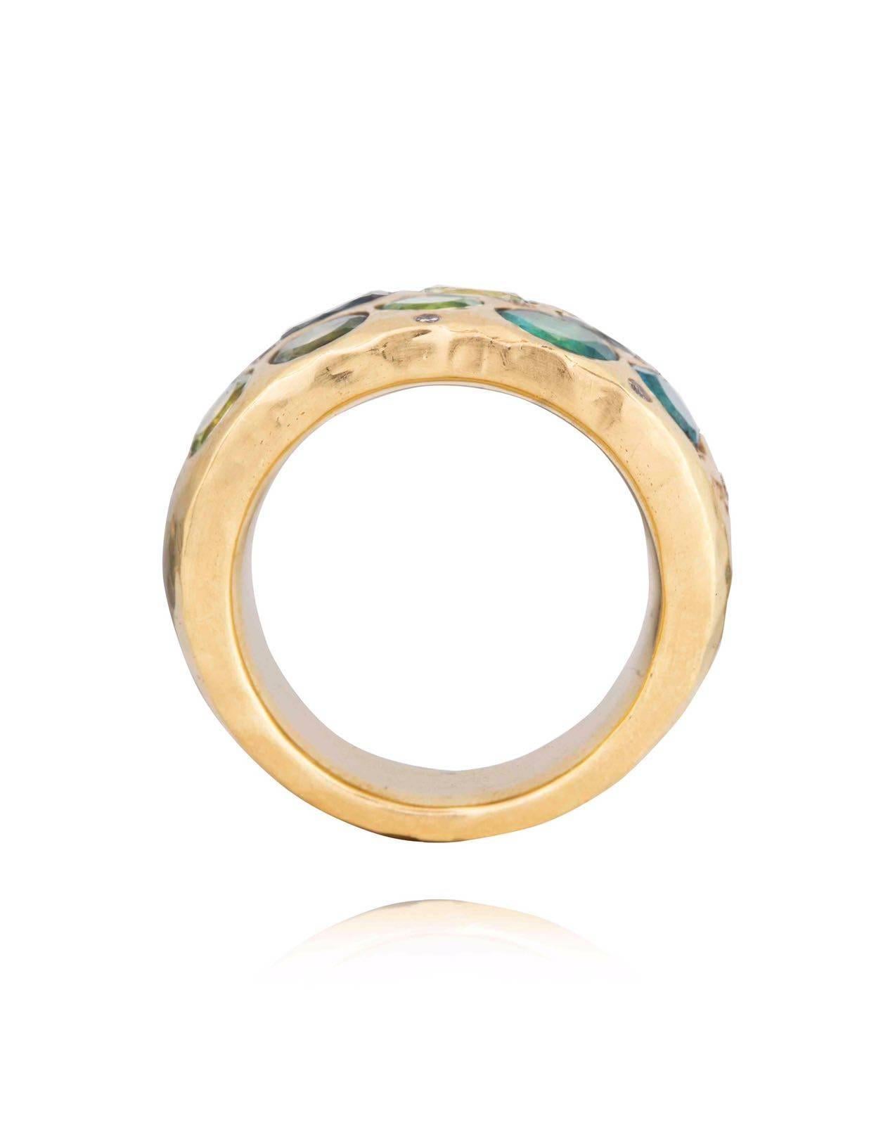 Blue and Green Tourmaline and Diamond 18 Karat Gold Ring. 

The Indian Ocean ring is handmade with a hand beaten gold finish. The ring is solid gold and has a feeling of weight to it. 

Size USA 8 / EUR 58 in stock. 

Other ring sizes can be ordered