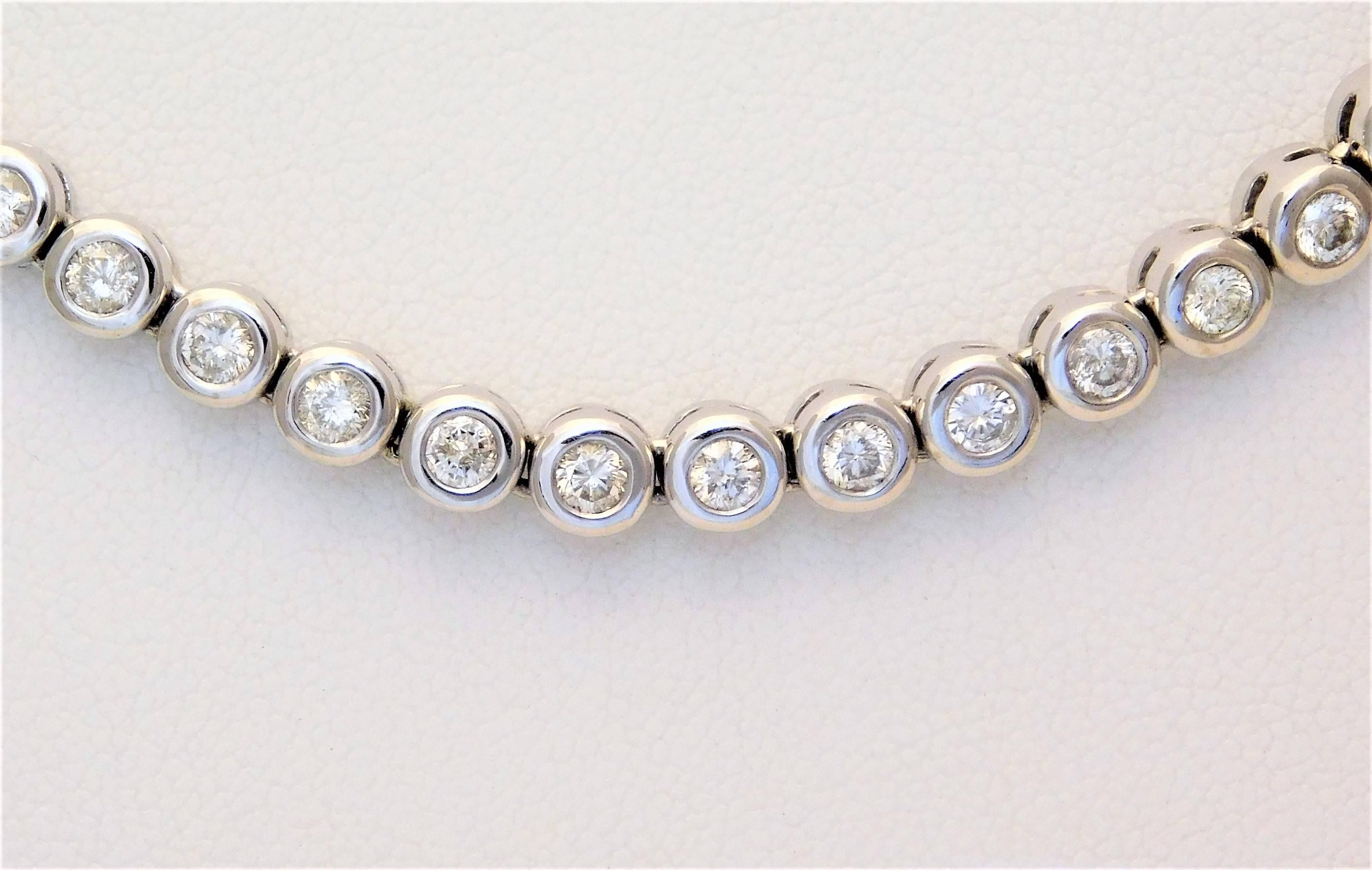 Exquisite 14k White Gold Rivière Necklace with Over 15ct of Bright and Sparkling Round Diamonds

An estate piece.  This absolutely fabulous necklace is made of solid 14k white gold.  It is polished, cleaned, and in “like new” condition.  This