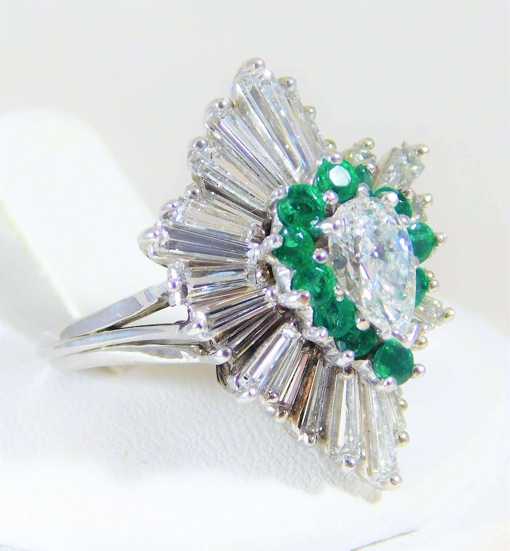 Amazing 1970s Diamond and Emerald Ballerina Ring

This gorgeous ring is made of solid 18k .  Surrounding its outer boarder, it is masterfully jeweled with 3 carats of dazzling baguette diamonds giving it that very desired ballerina style appearance.
