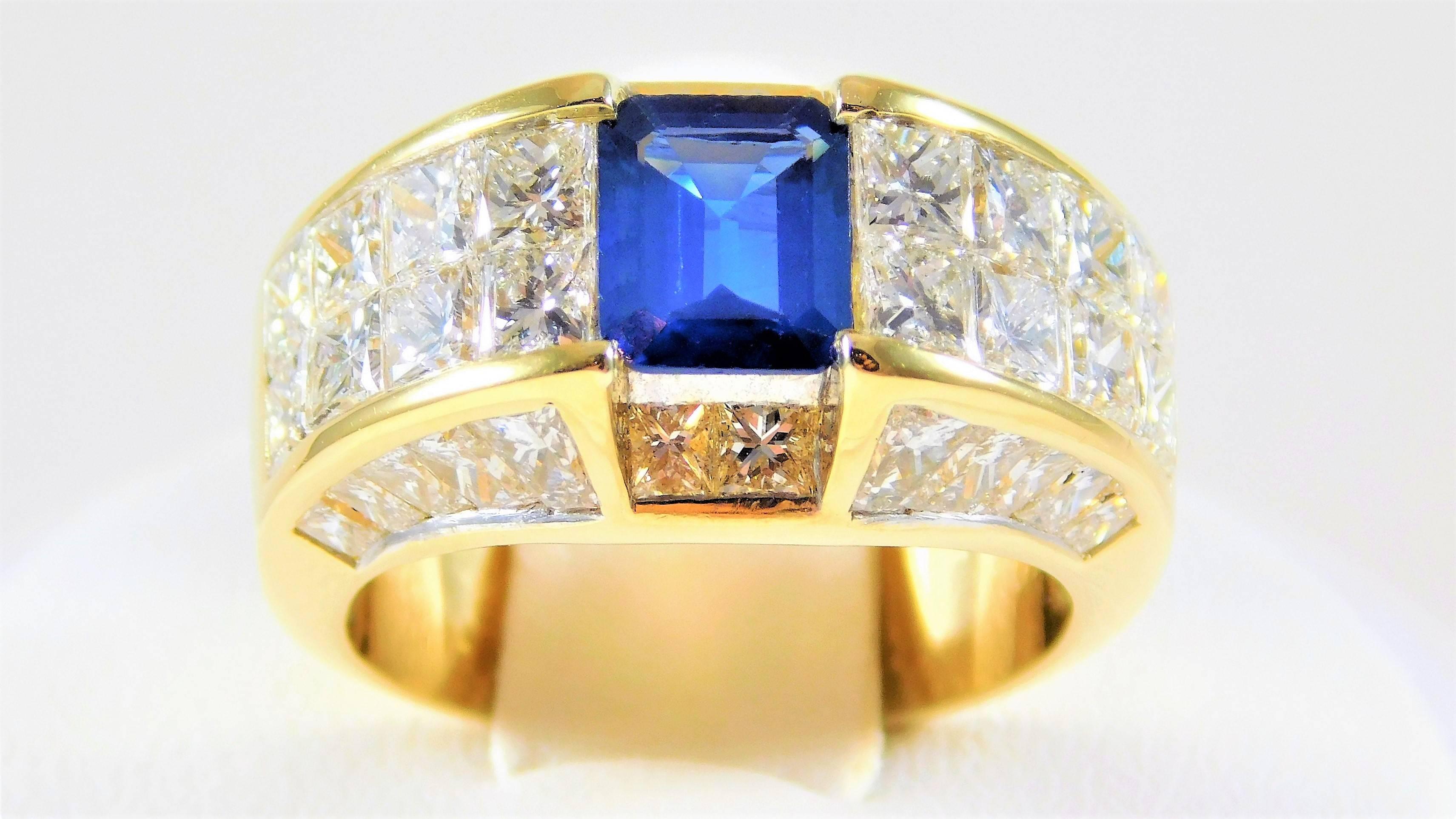 Breathtaking 18k Gold Ring with Emerald-Cut Sapphire and Rare Quadrillion-Cut Diamonds 

An Estate Piece! Inspired by the 1985 De Beers Award Winner ATW Ring.  This unique and exotic ring is made of solid 18kt Yellow Gold. It is masterfully jeweled