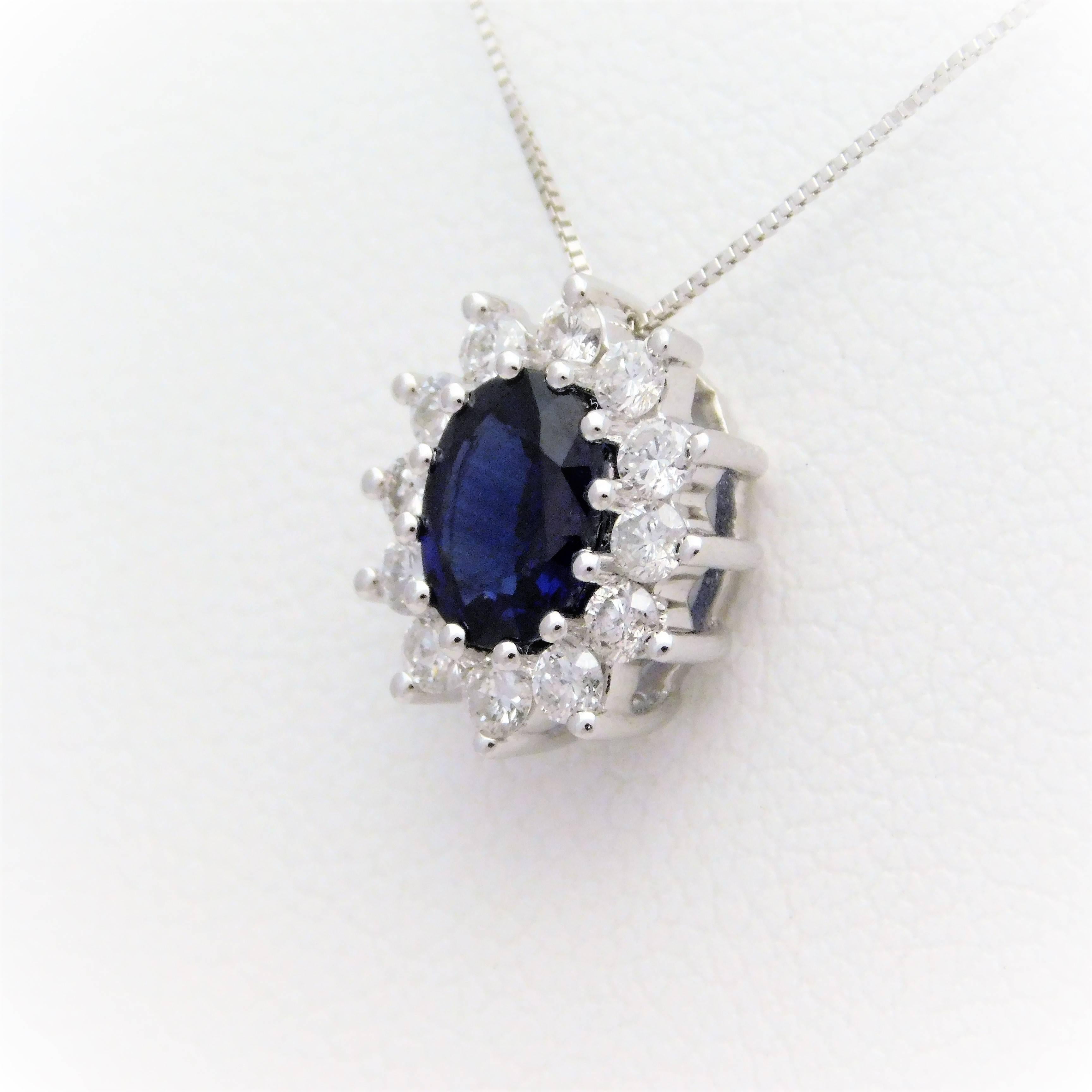 Oval Cut 14 Karat White Gold Natural Deep Blue Sapphire and Diamond Halo Pendant Necklace
