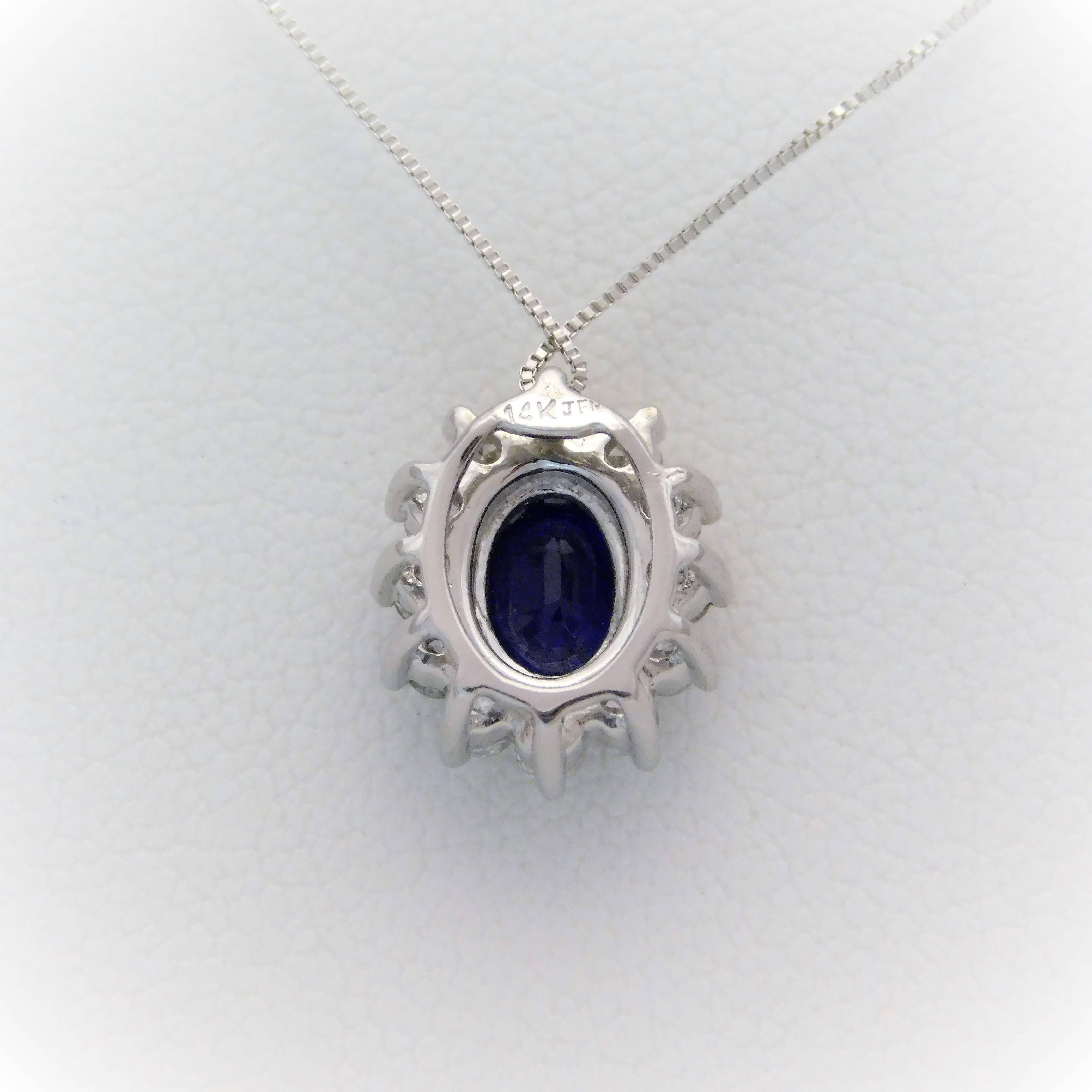 14 Karat White Gold Natural Deep Blue Sapphire and Diamond Halo Pendant Necklace In New Condition In Metairie, LA
