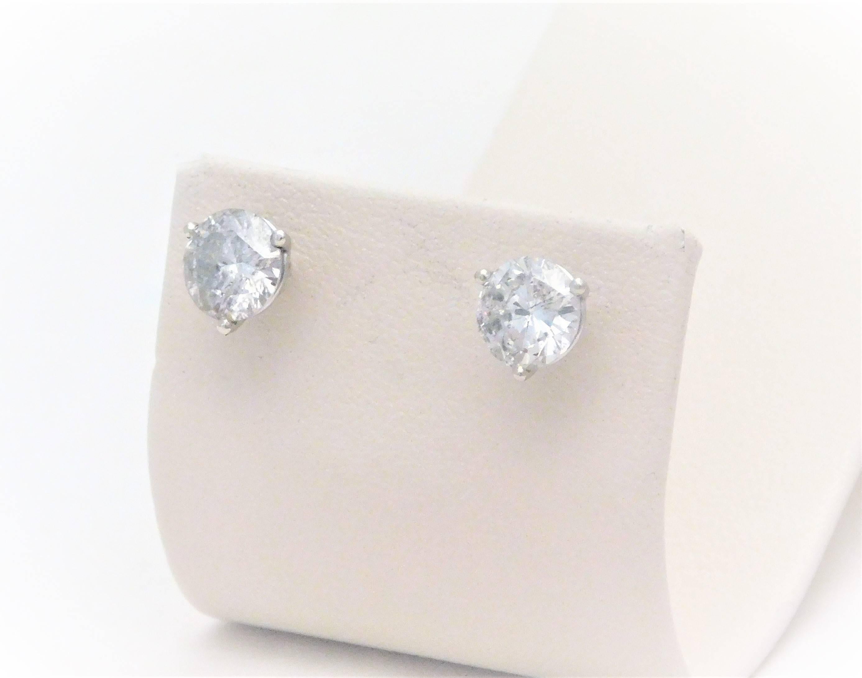 Round Cut 2.12 Carat Total Weight Diamond Stud Earrings For Sale