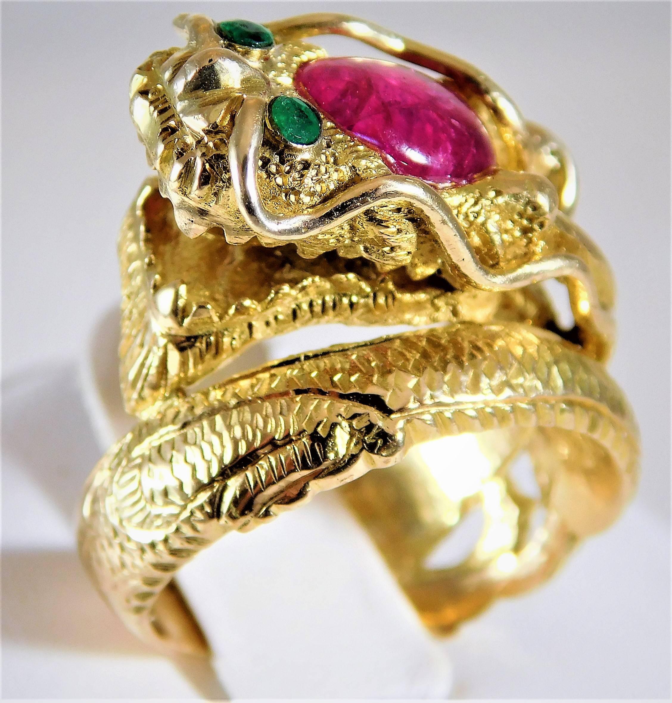 Ancient Chinese Dragons symbolize cosmic CHI (energy) and Good Fortune! From a worldly estate.  Circa 1960.  This absolutely amazing and unique ring has been hand crafted in solid 14k yellow gold.  The craftsmanship on this piece is extraordinary