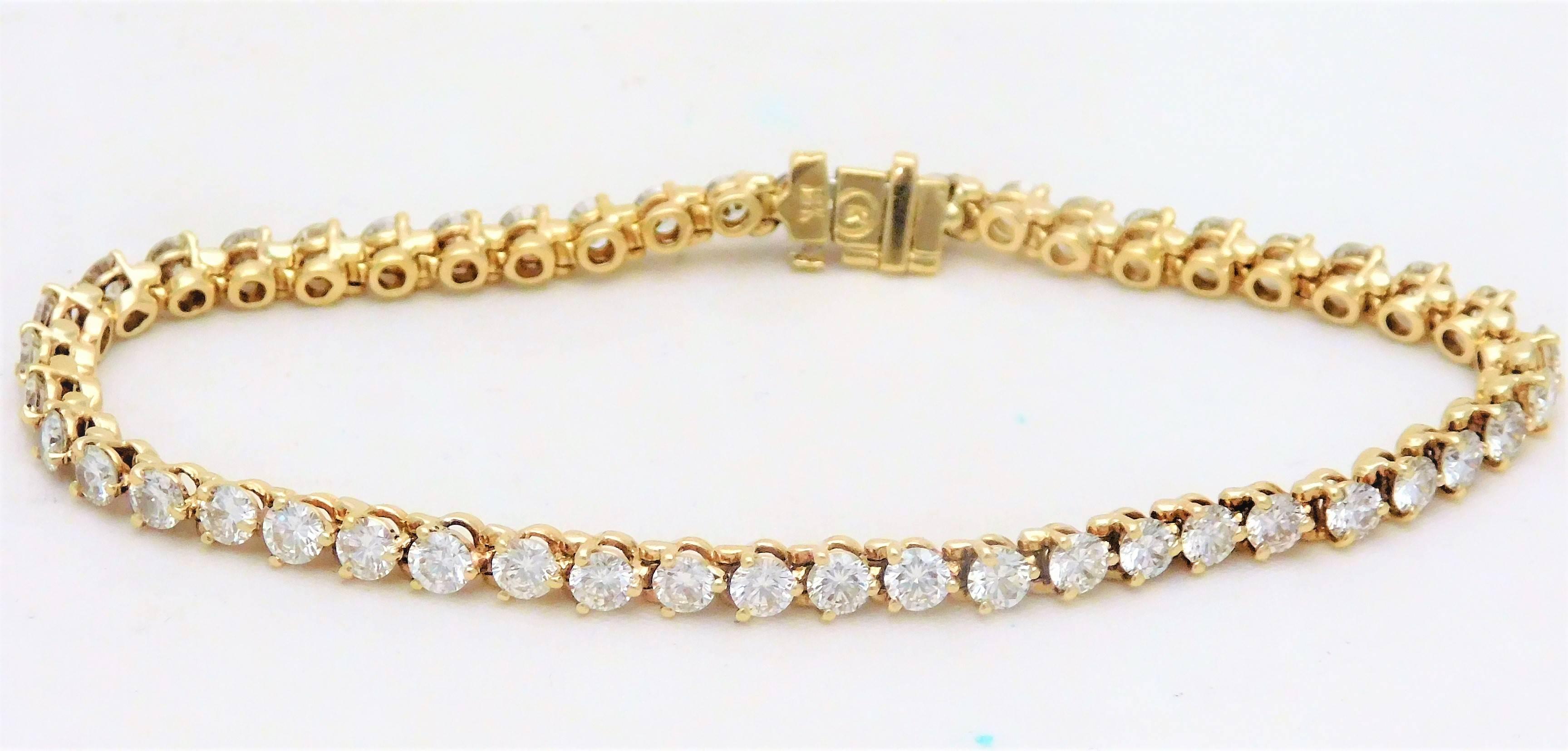One of the most popular jewelry designs in the world, the timeless tennis bracelet represents a true staple in every ladies’ wardrobe.  From an amazing Southern estate.  Circa 2000.  This modern bracelet has been hand crafted in solid 18k yellow