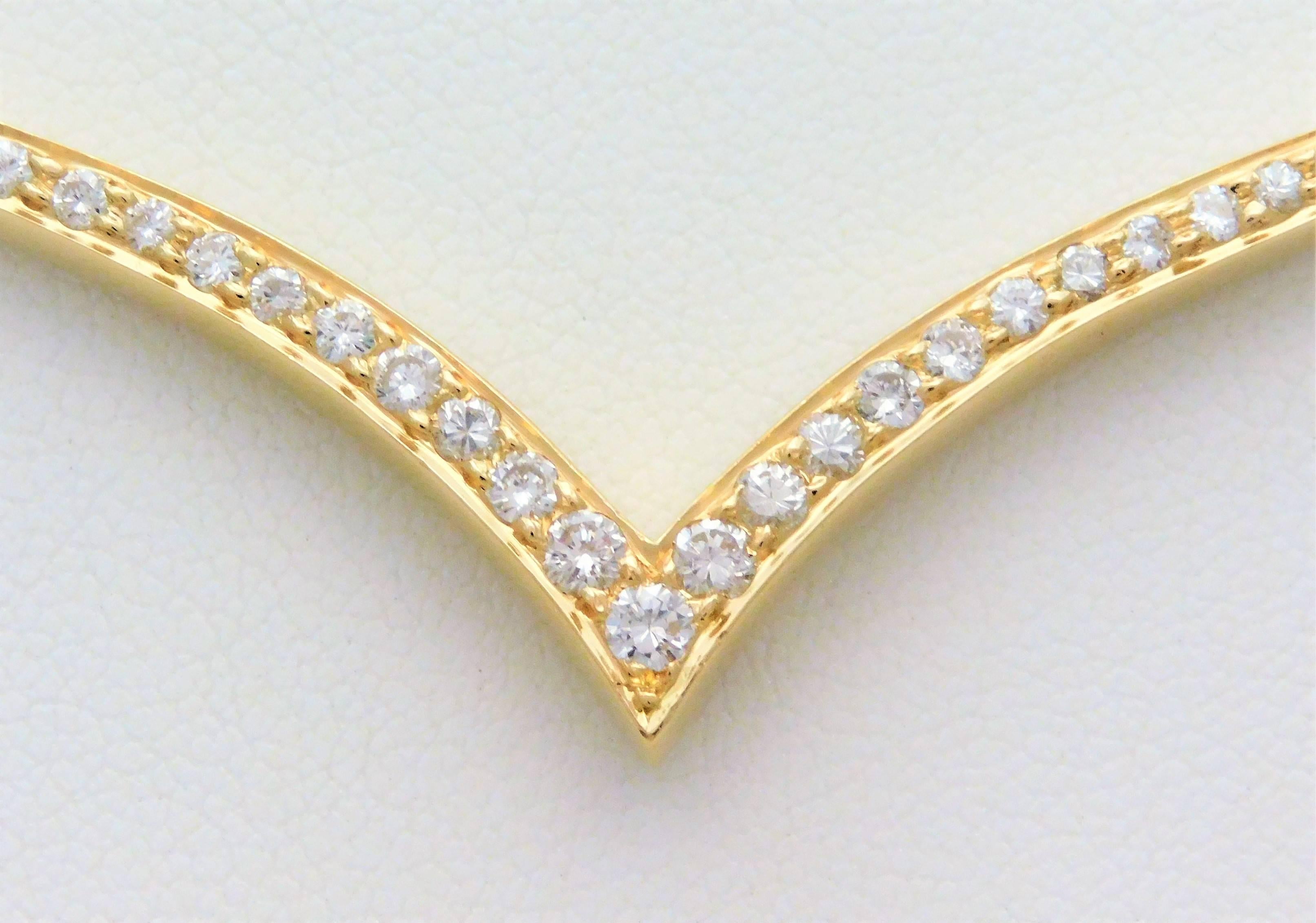 gold v pendant