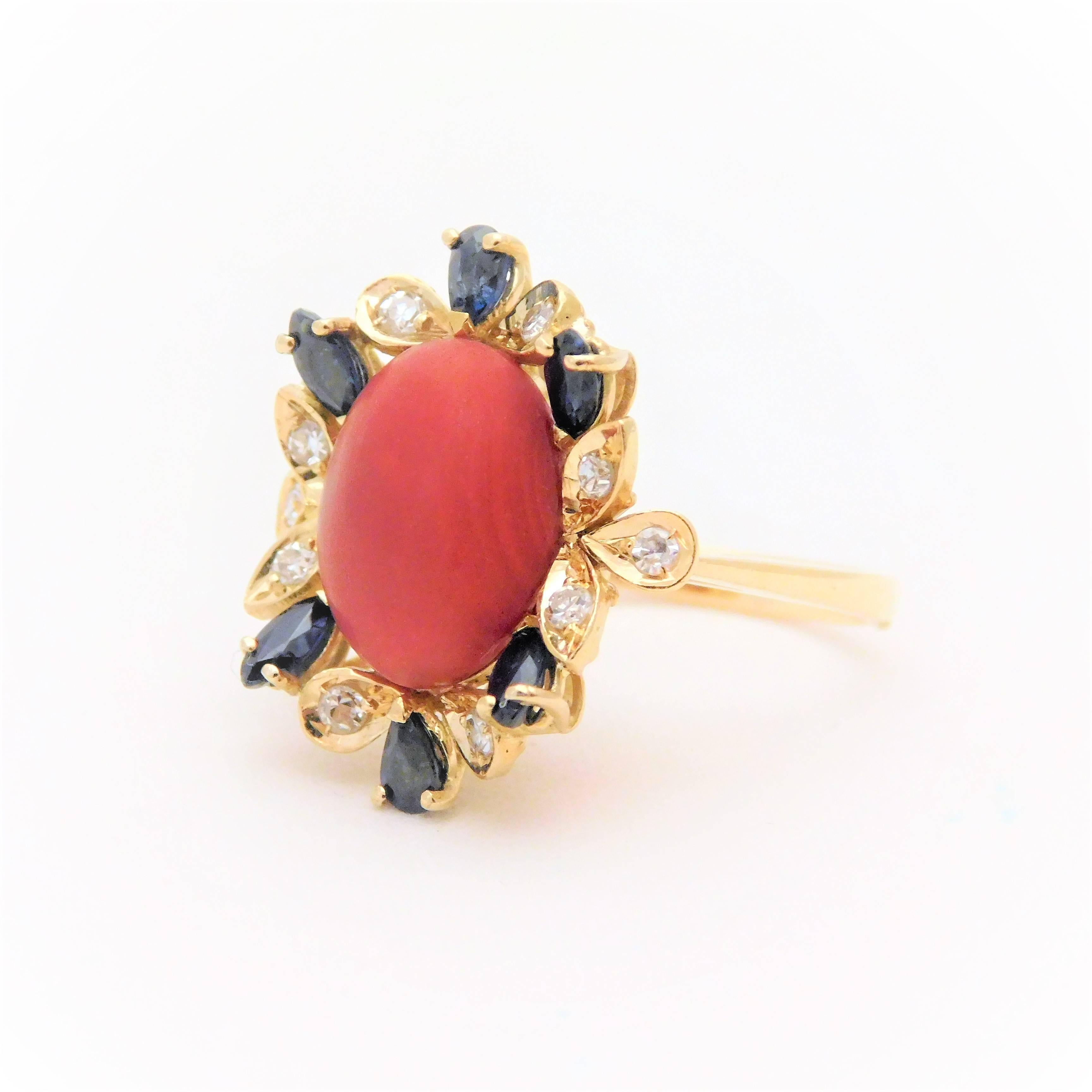 Oval Cut Coral Cabochon, Sapphire, and Spinel Cocktail Ring