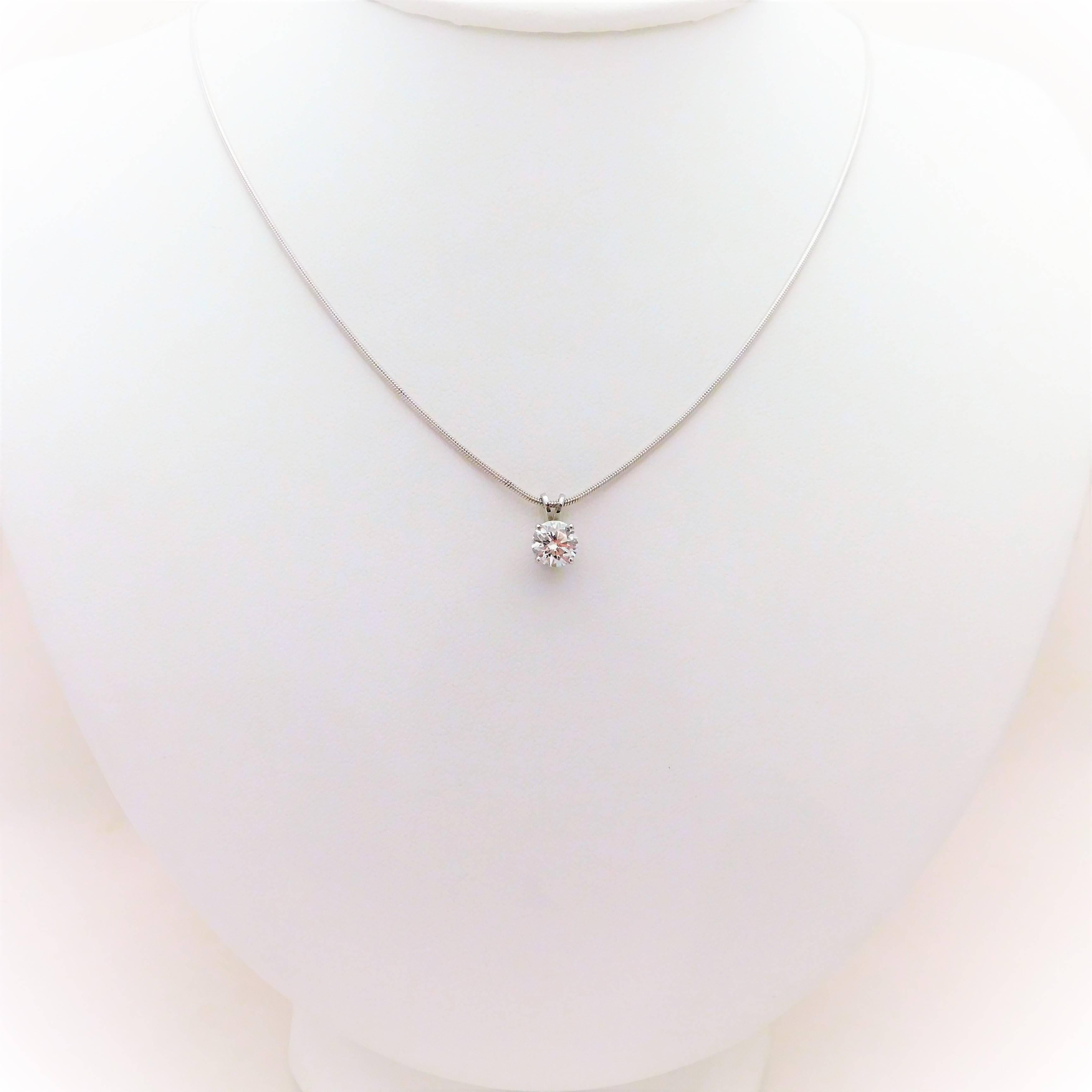 A custom piece by Edberg Jewelry.  The solitaire diamond pendant represents a staple in every ladies’ wardrobe.  It classy, simple, and elegant.  This solitaire-style necklace has been crafted in solid 14k white gold.  It has been masterfully