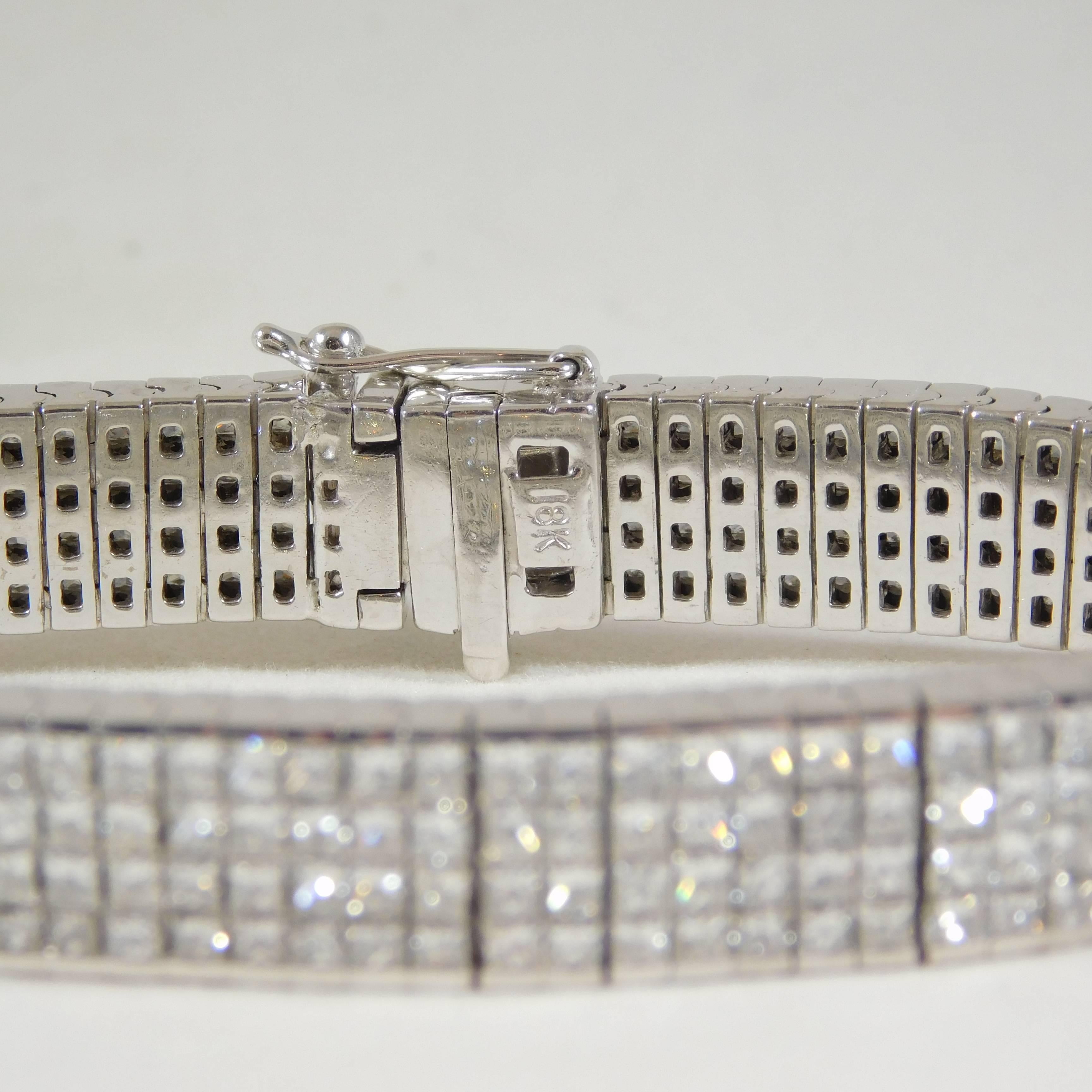 Hand-Made 18k White Gold and 11ct Diamond Bracelet


From a Wealthy Estate! This stunning handmade 18kt white gold diamond bracelet has over 350 dazzling princess cut diamonds.  The craftsmanship is extraordinary and a great example of a fine