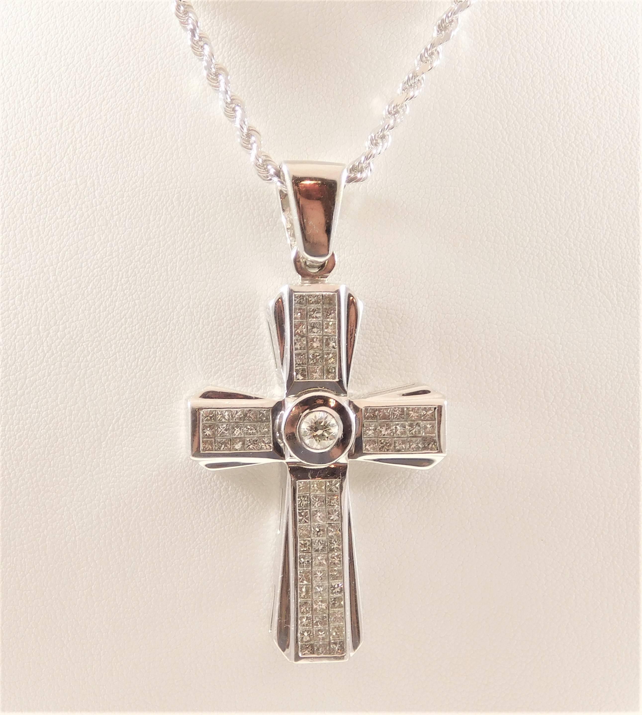 An Estate Piece! Not your average pendant.  This breathtaking, luxurious diamond gothic style cross pendant is made of solid 14k white gold.  It is most definitely a statement piece and sure to bring plenty of bling.  It is a gorgeous work of art