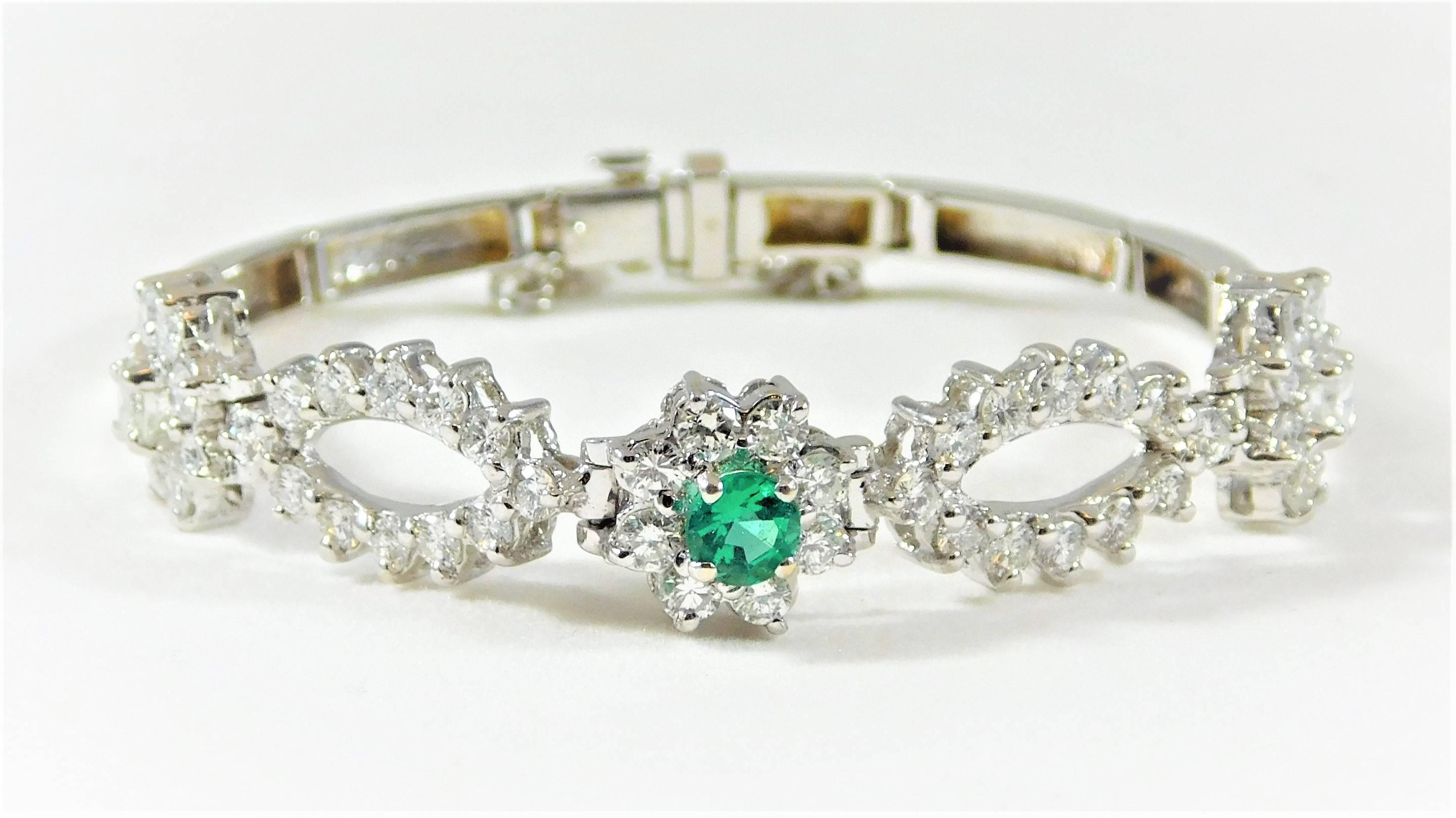 
Circa 1940.  This dazzling bracelet is made of solid 14k white gold.  It is masterfully jeweled with 50 immaculate round brilliant-cut diamonds totaling an approximate 2.50ct.  All of these diamonds are H color and VS1 clarity and alternate between