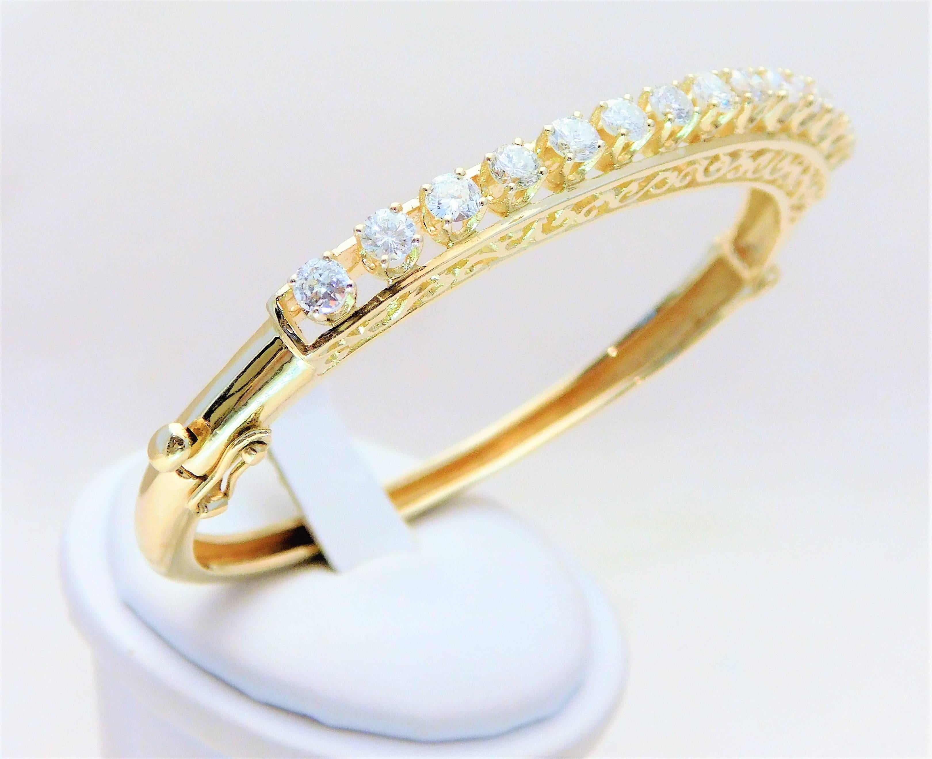 The bangle bracelet is one of the oldest forms of jewelry known to man-kind.  Even today, it represents a staple in any lady’s wardrobe.  From an uptown New Orleans Estate.  This breathtaking bangle bracelet has been crafted in solid 14k yellow gold