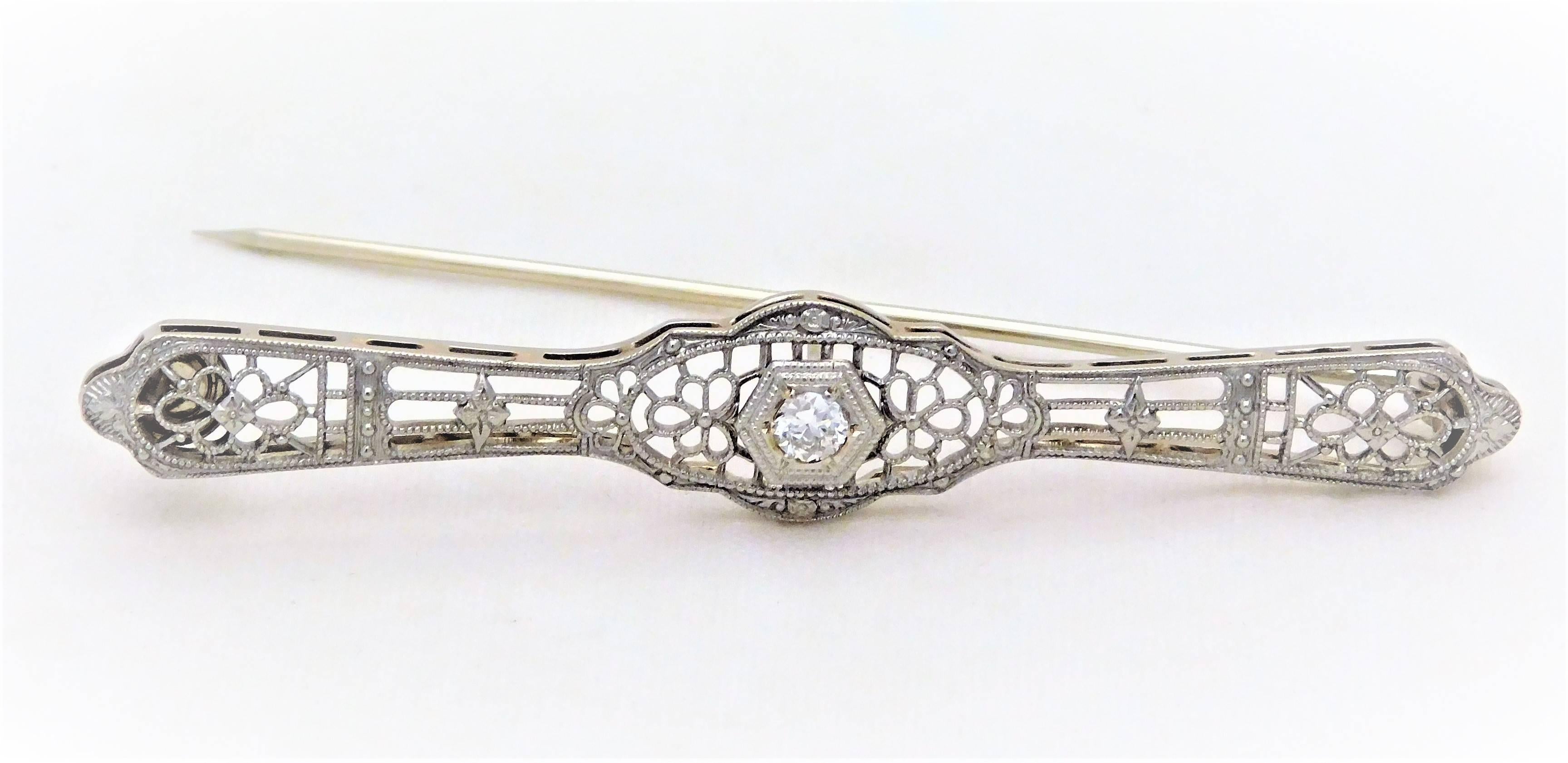 Edwardian 10k White Gold and Diamond Bar Pin
100+ years ago bar pins were an everyday tool in the early to mid-1900’s.  Much like brooches, bar pins have a bar hinged on one end with a locking mechanism on the other.  They were most popularly worn