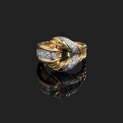 Diamonds and 18 Karat Ring, Decorated and Designed with a Buckle, Mauboussin