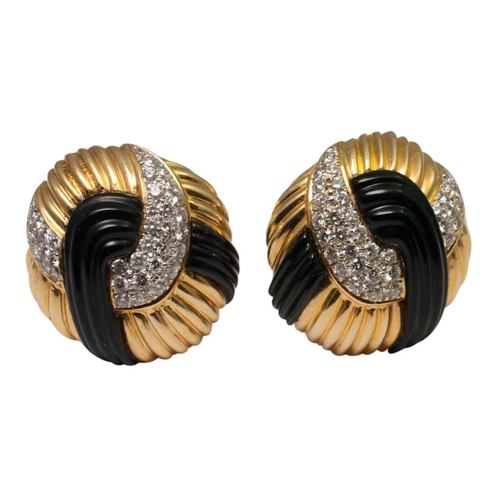 Circa 1970s Onyx Diamond 18 Carat Gold Round Knot Stud Earrings For Sale