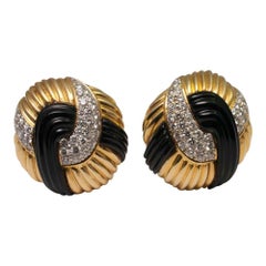 Circa 1970s Onyx Diamond 18 Carat Gold Round Knot Stud Earrings